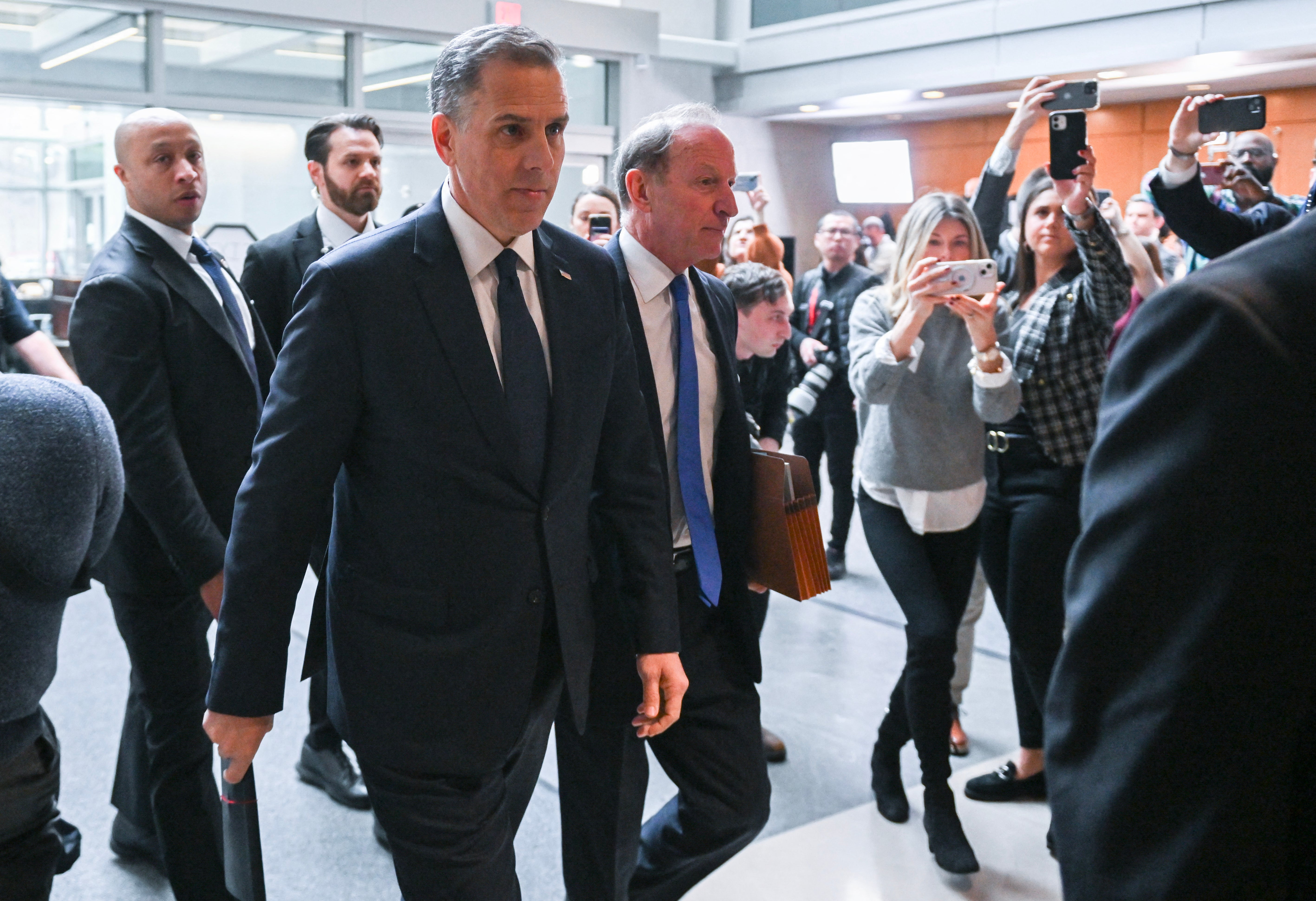 Hunter Biden arrives with attorney Abbe Lowell at the O’Neill House Office Building for a closed-door deposition