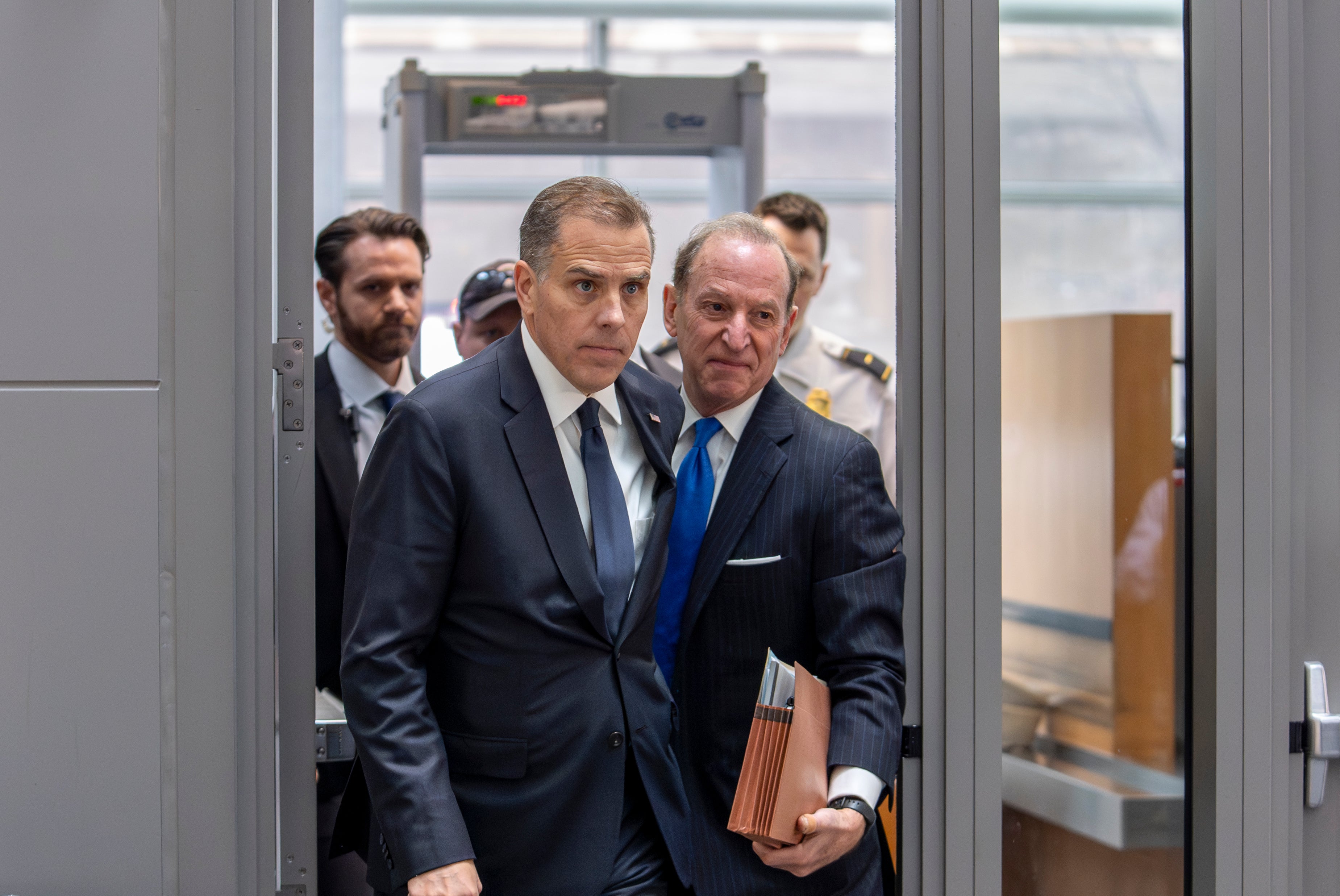 Hunter Biden, left, son of President Joe Biden, arrives with attorney Abbe Lowell at the O'Neill House Office Building for a closed-door deposition in February