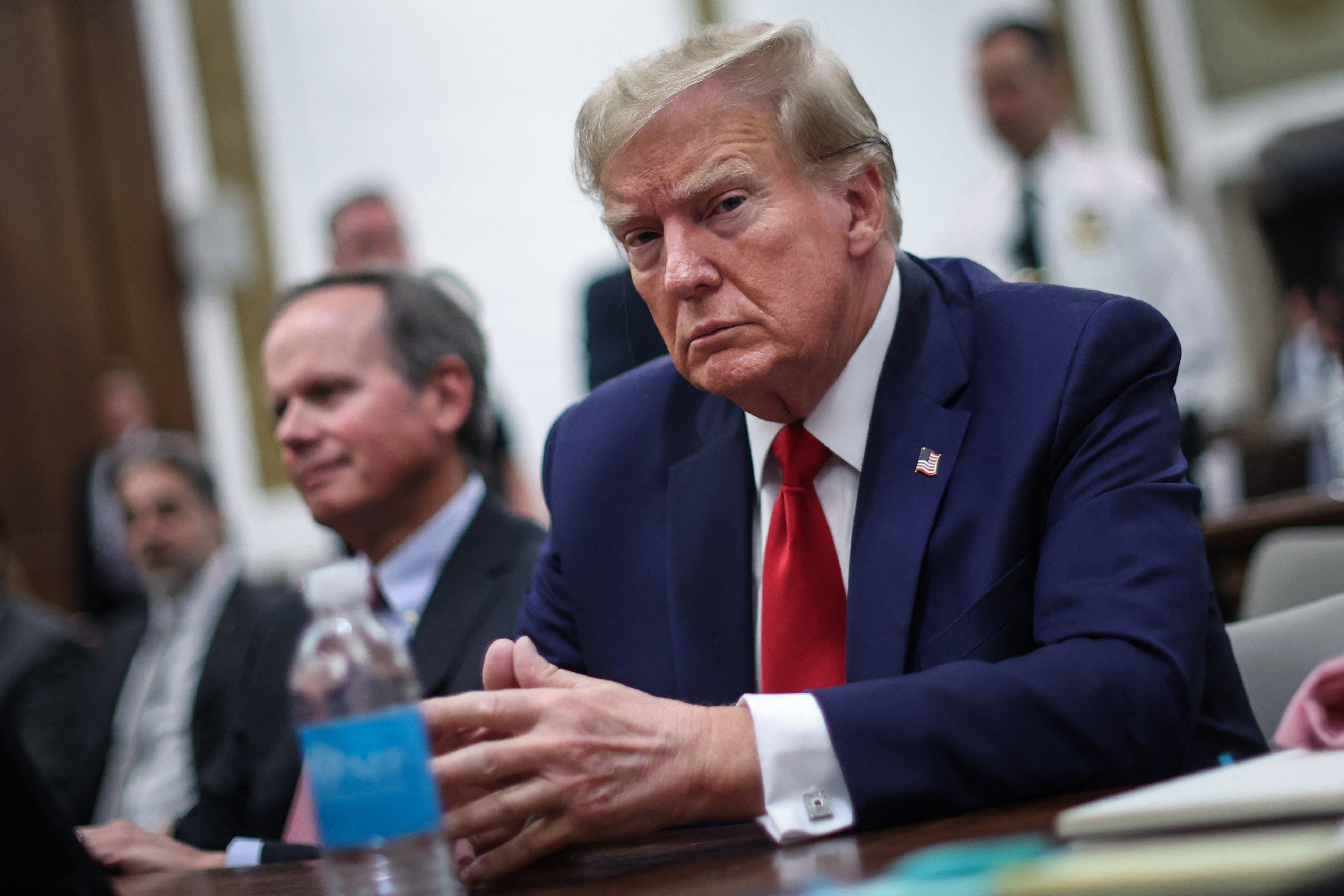 Donald Trump looks on at the New York State Supreme Court