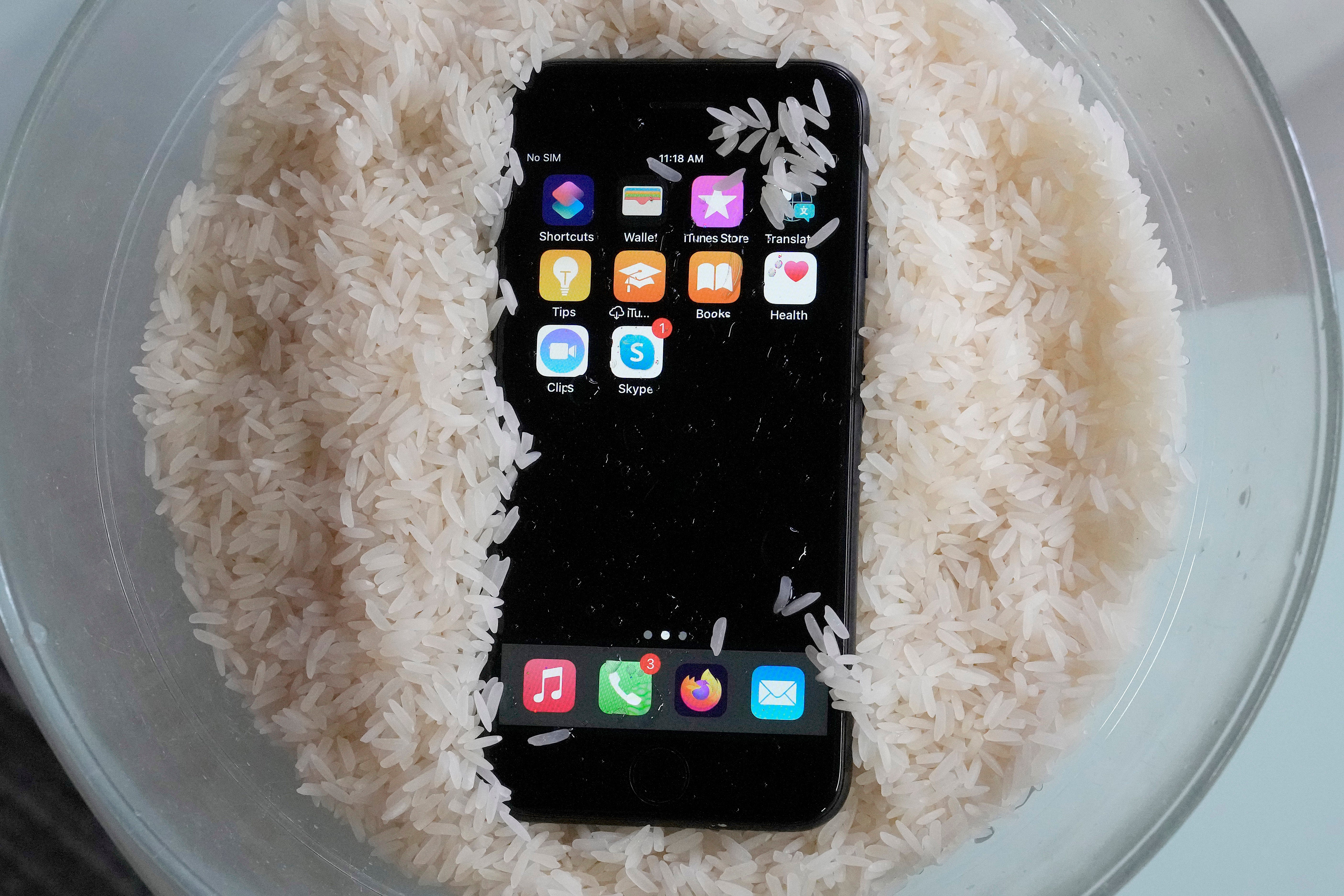 Plunking your wet phone in a bowl of rice is a common go-to