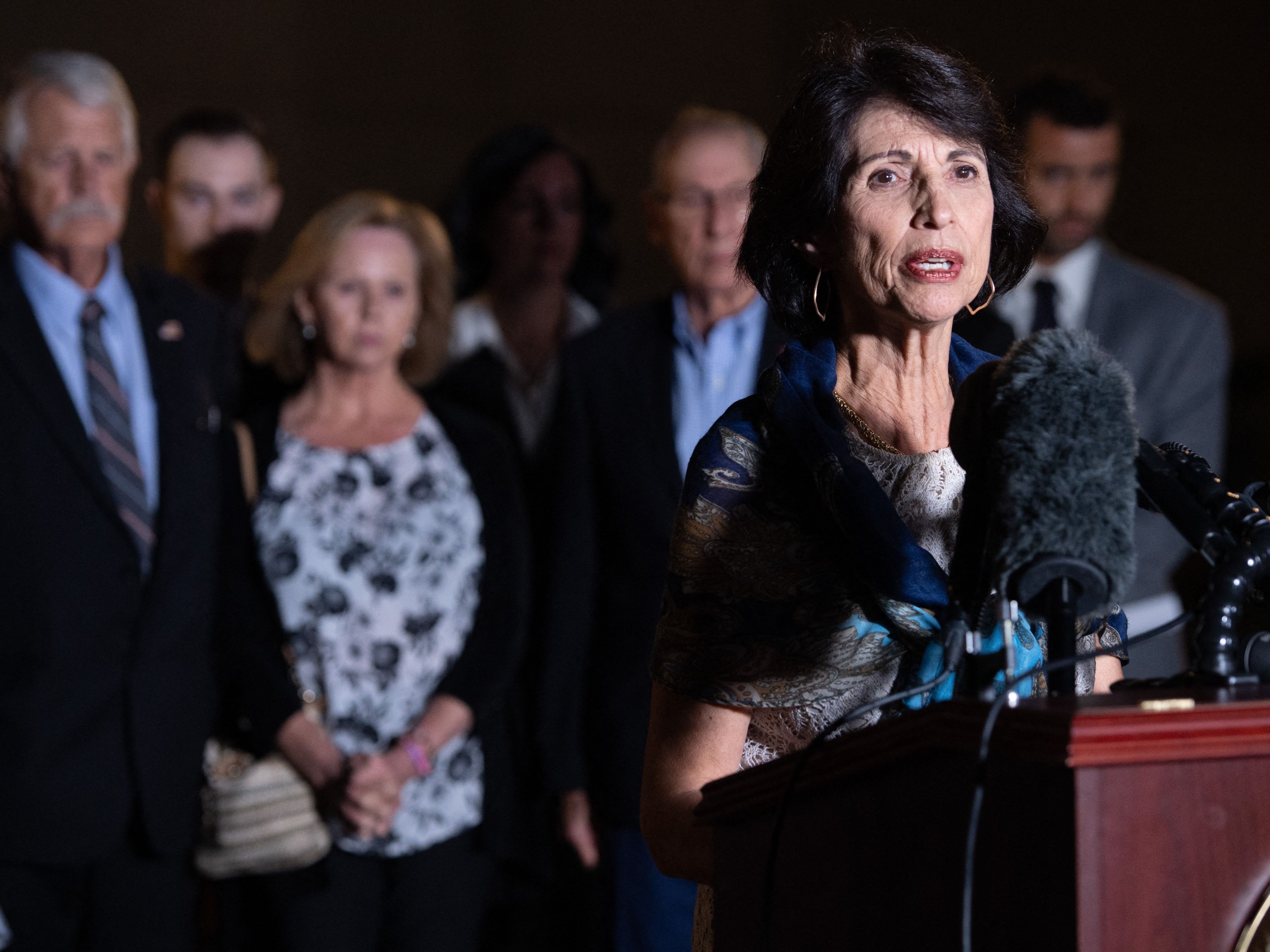 Foley speaking alongside the parents of activist Kayla Mueller, who was killed by Isis in 2015