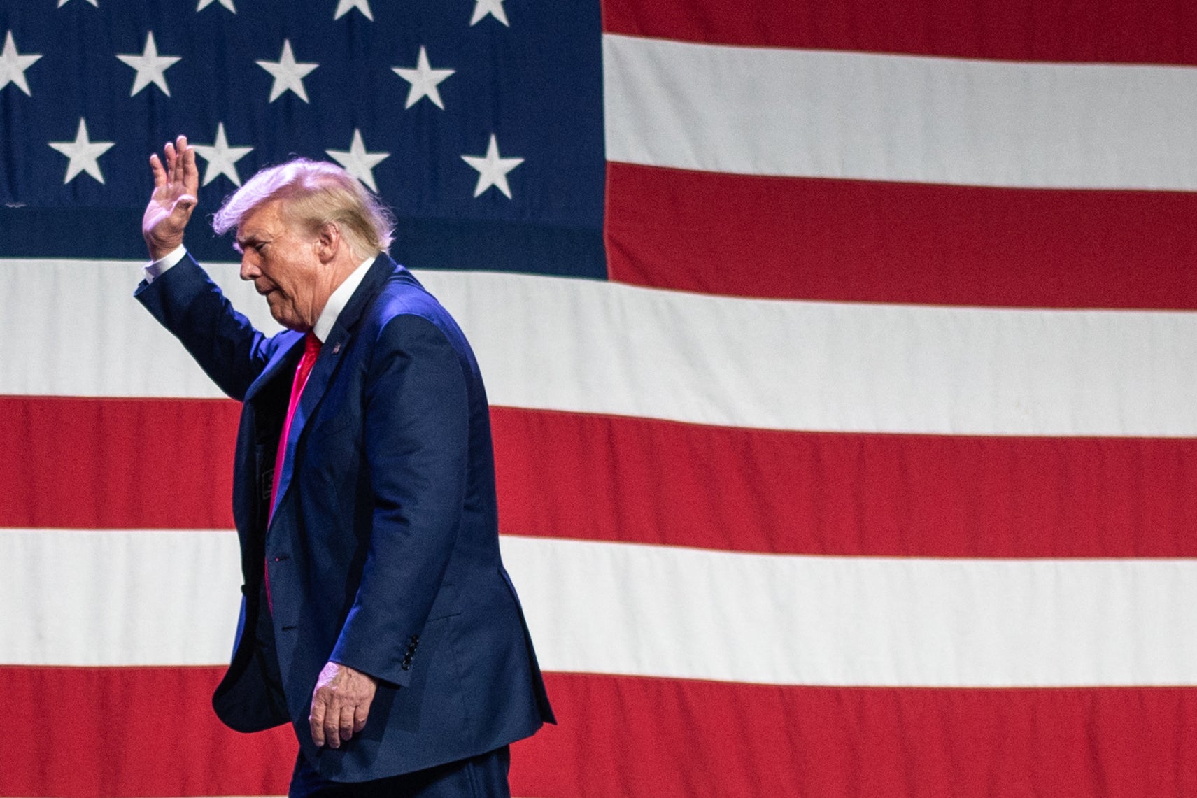 Former US president and 2024 Republican Presidential hopeful Donald Trump leaves after speaking at the Republican Party of Iowa's 2023 Lincoln Dinner at the Iowa Events Center in Des Moines, Iowa, on July 28, 2023