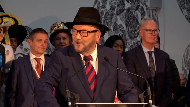 A smiling George Galloway takes aim at Labour leader Keir Starmer after being elected as Rochdale MP