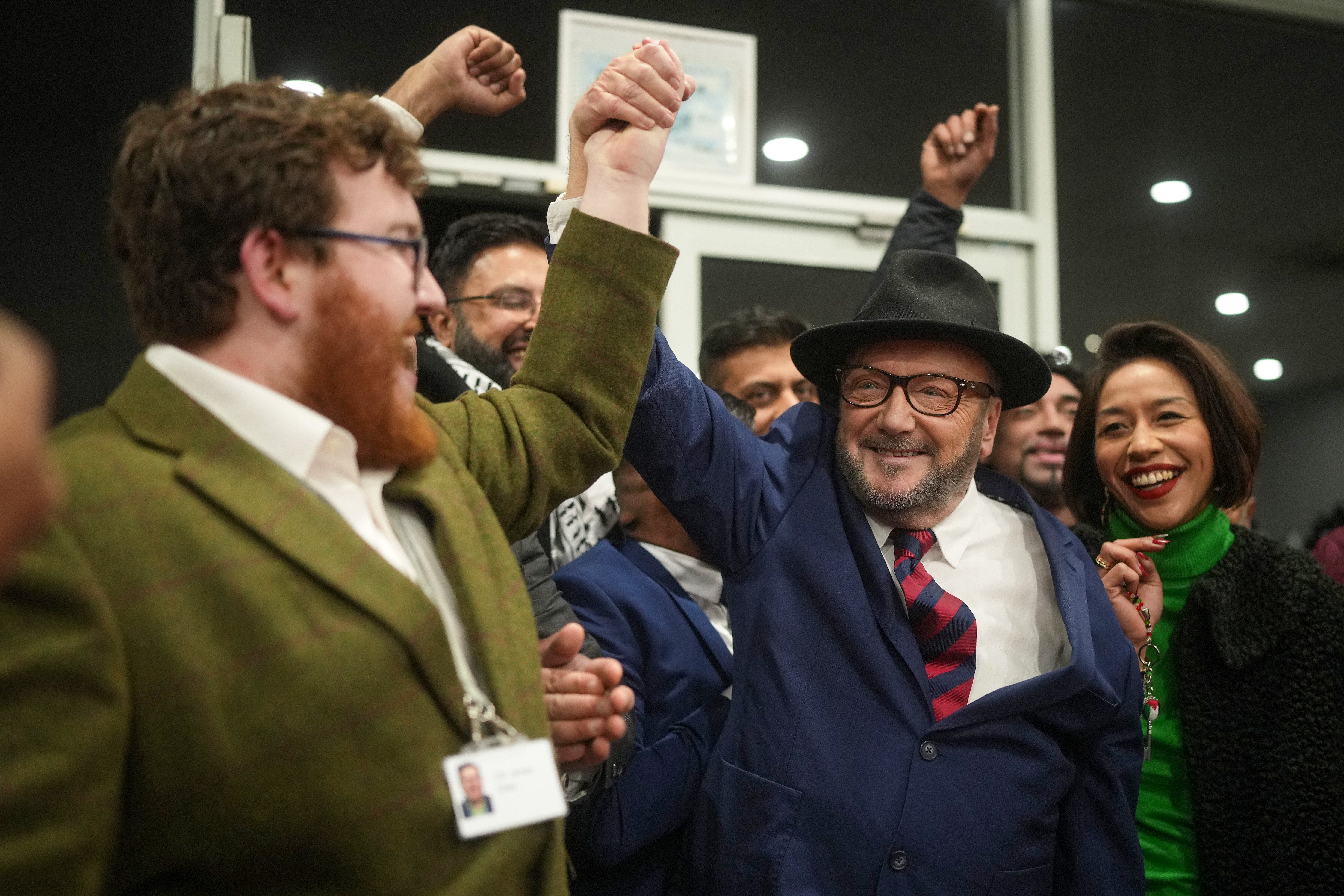 George Galloway celebrates after taking almost 40 per cent of the vote in the Rochdale by-election