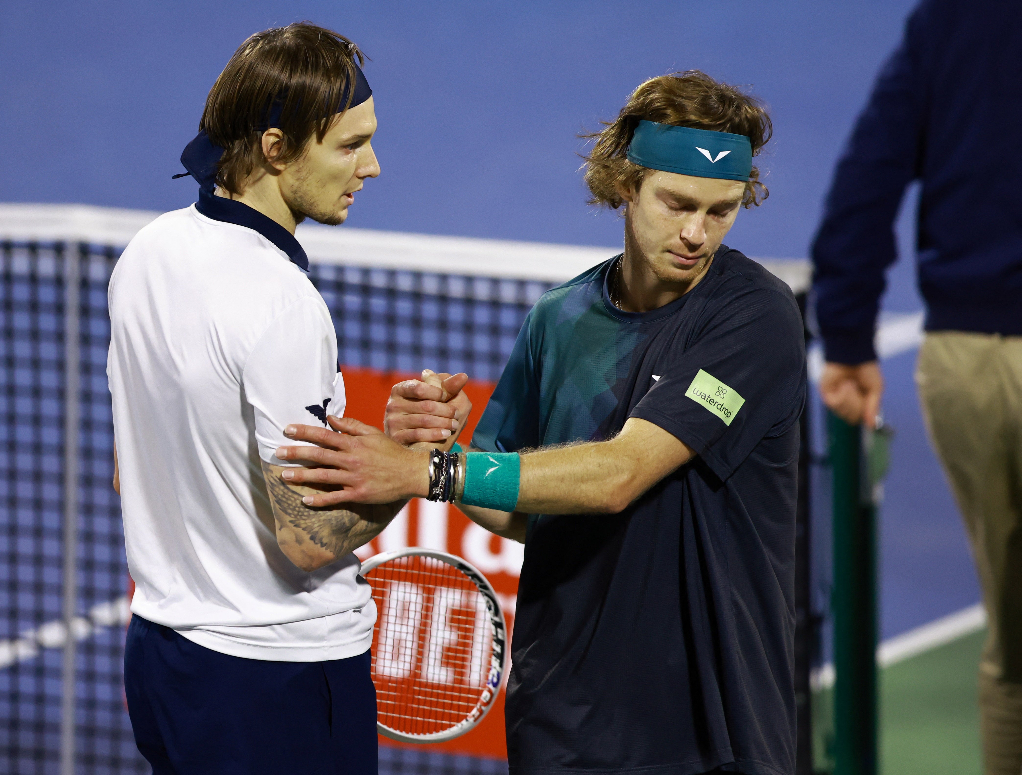 Rublev shakes hands with Bublik after being disqualified