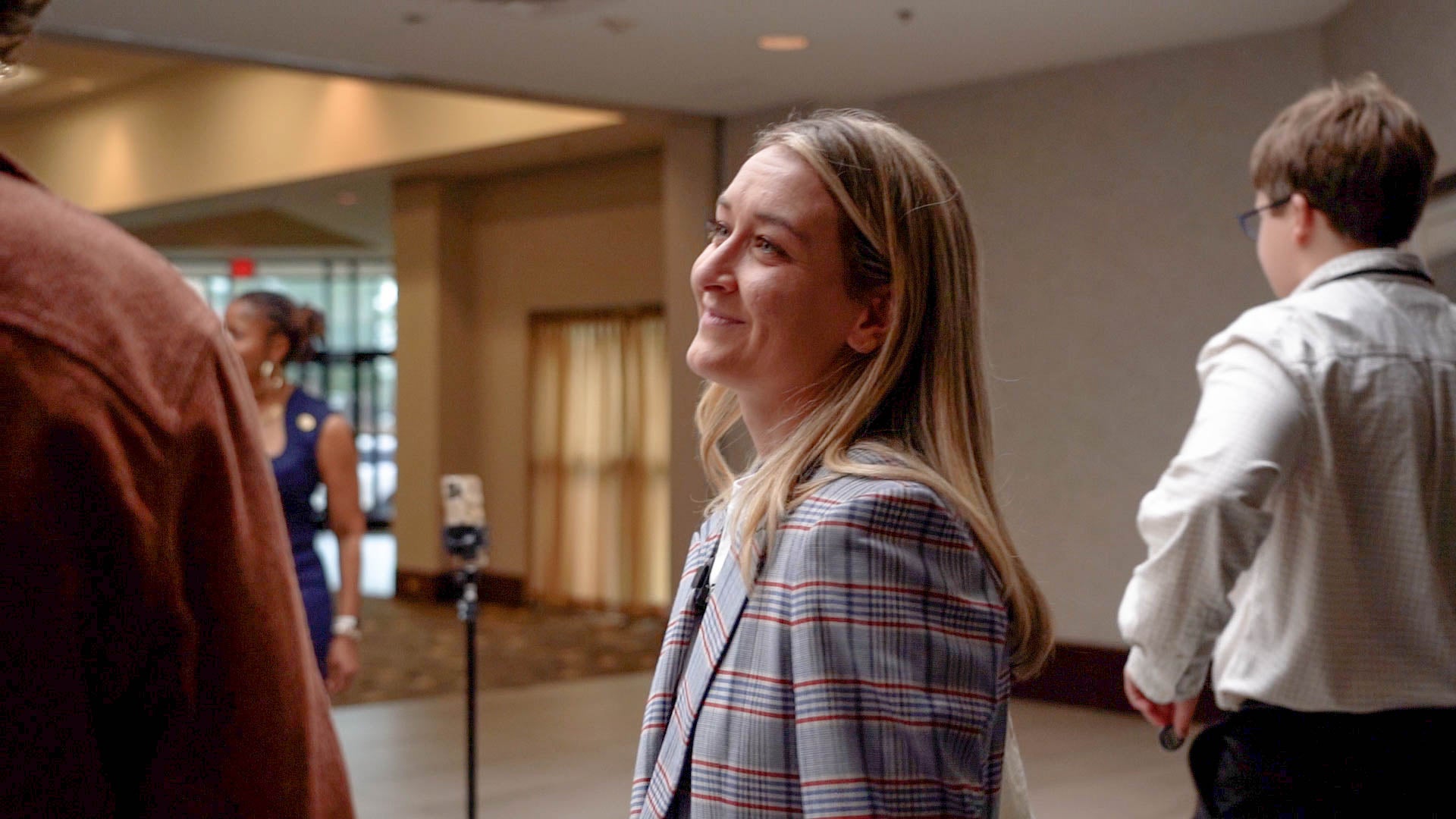 Anderson Clayton, 26, catches up with her fellow young Democrats at the Young Democrats of North Carolina Convention