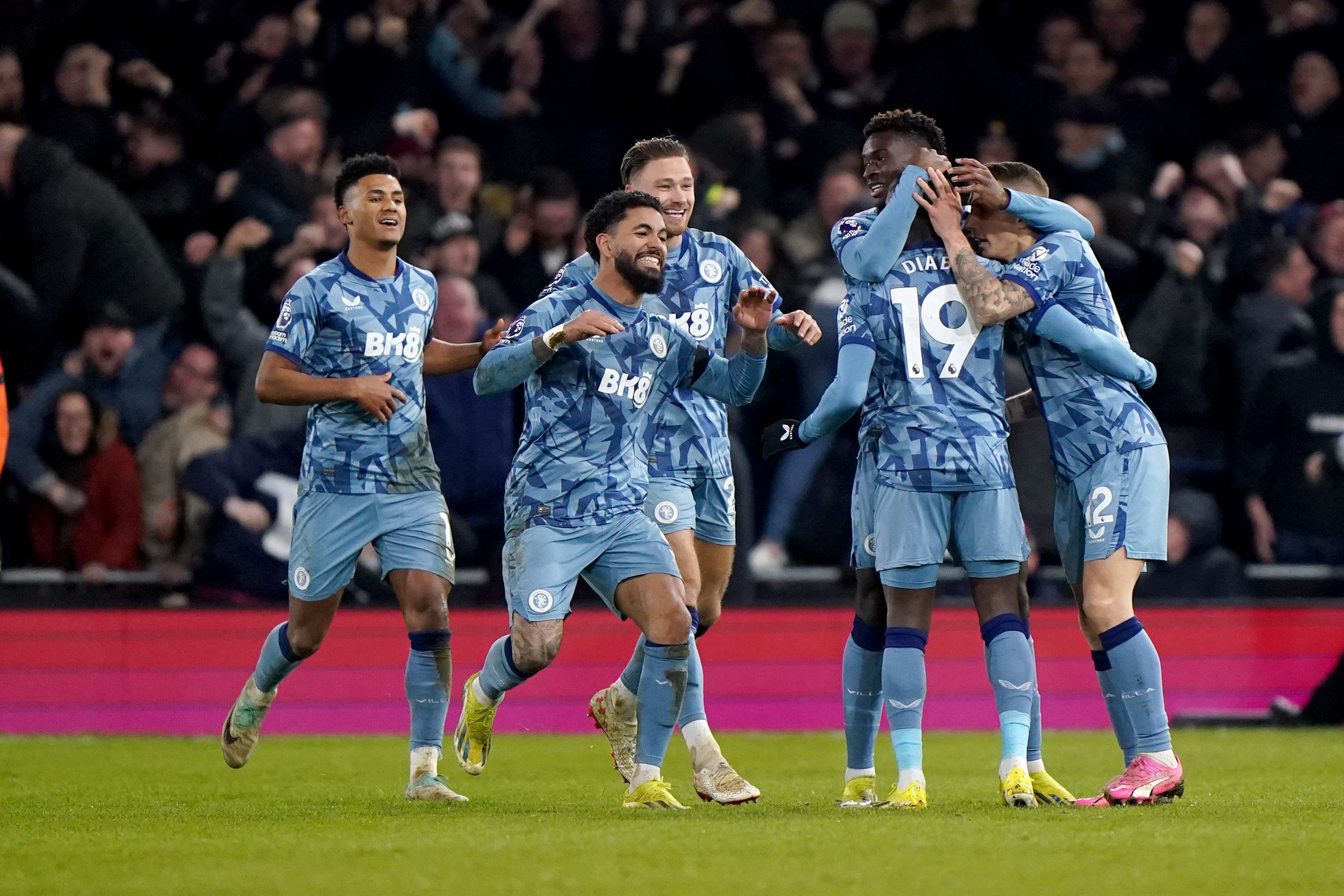 Aston Villa’s Lucas Digne (right) is congratulated by his team-mates (Bradley Collyer/PA)