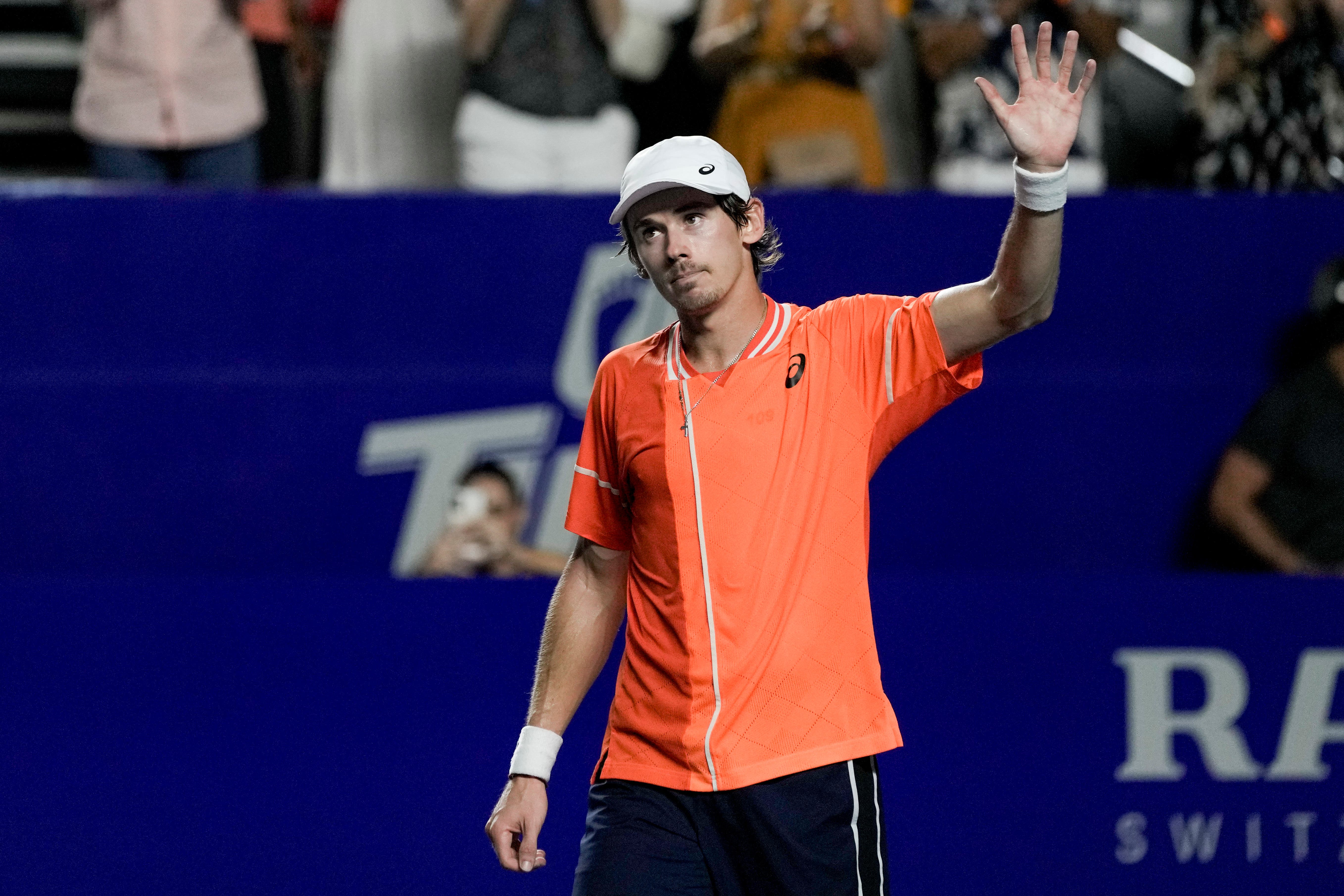 Alex de Minaur of Australia celebrates after defeating Casper Ruud of Norway during the final match of the Mexican Open tennis tournament in Acapulco (Eduardo Verdugo, AP)