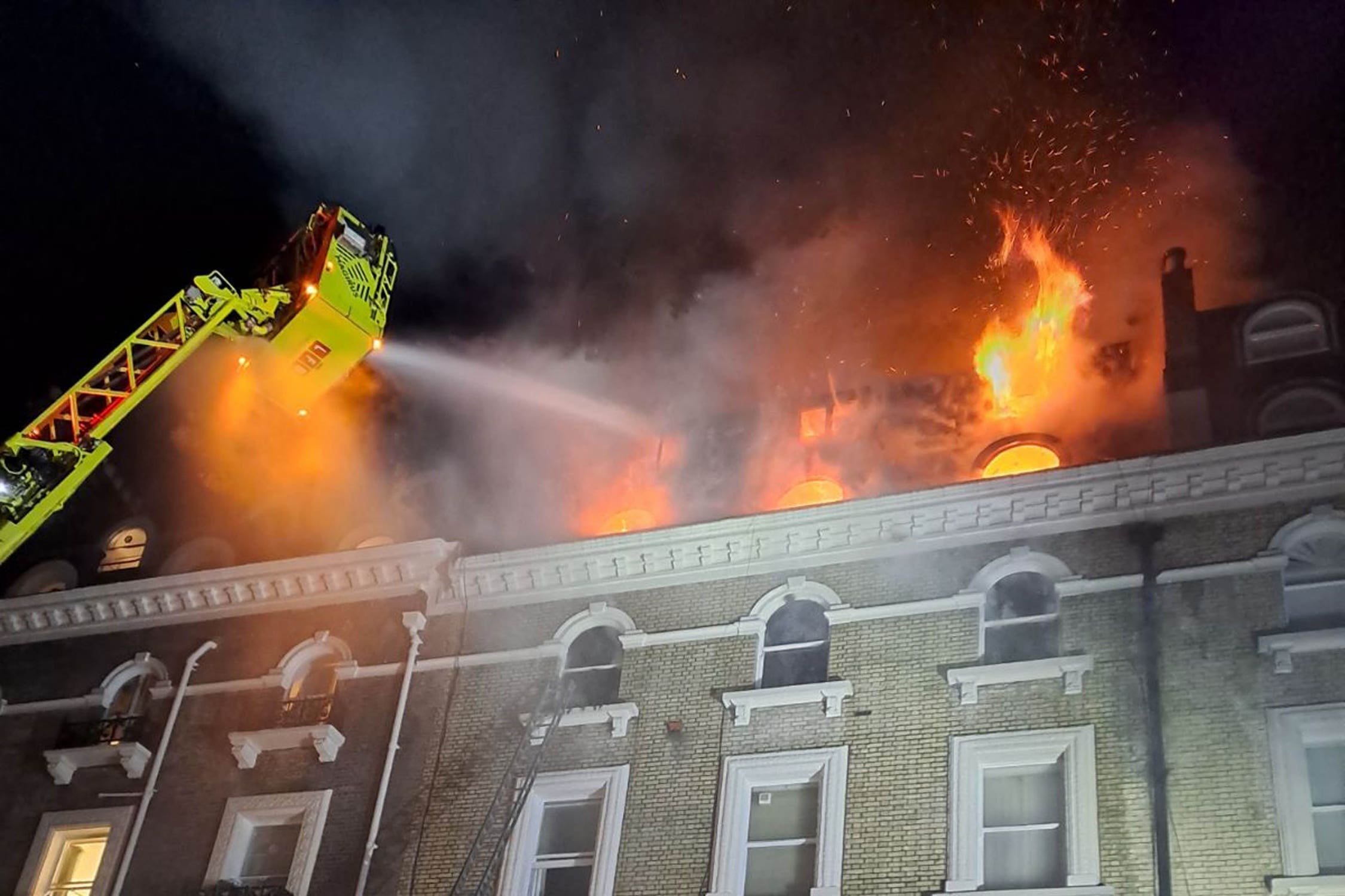 Emergency services at the scene of the fire at the five-storey building on Emperor’s Gate in South Kensington on Friday