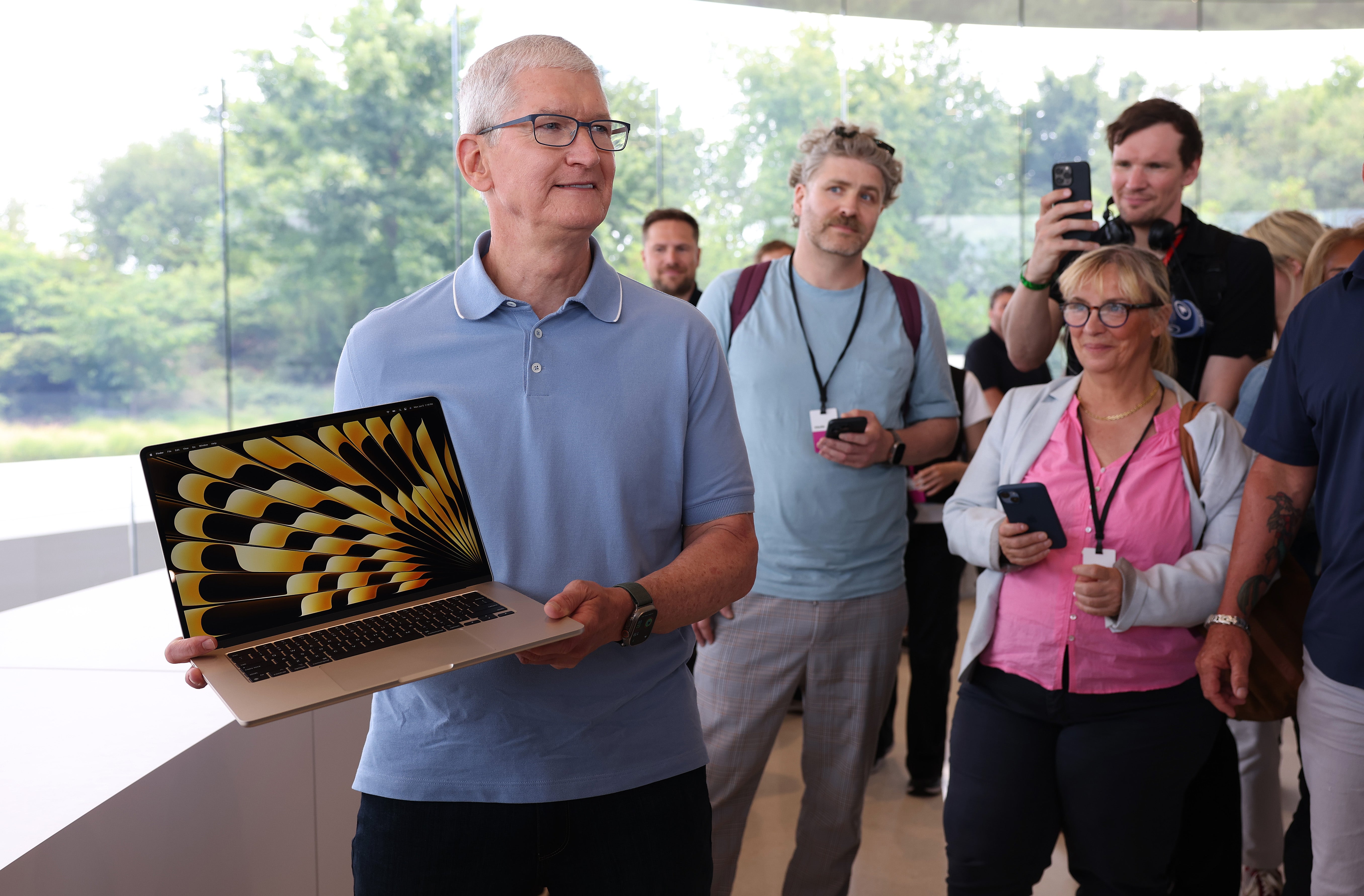 Apple chief executive Tim Cook with last year’s, then-new MacBook Pro 15-inch