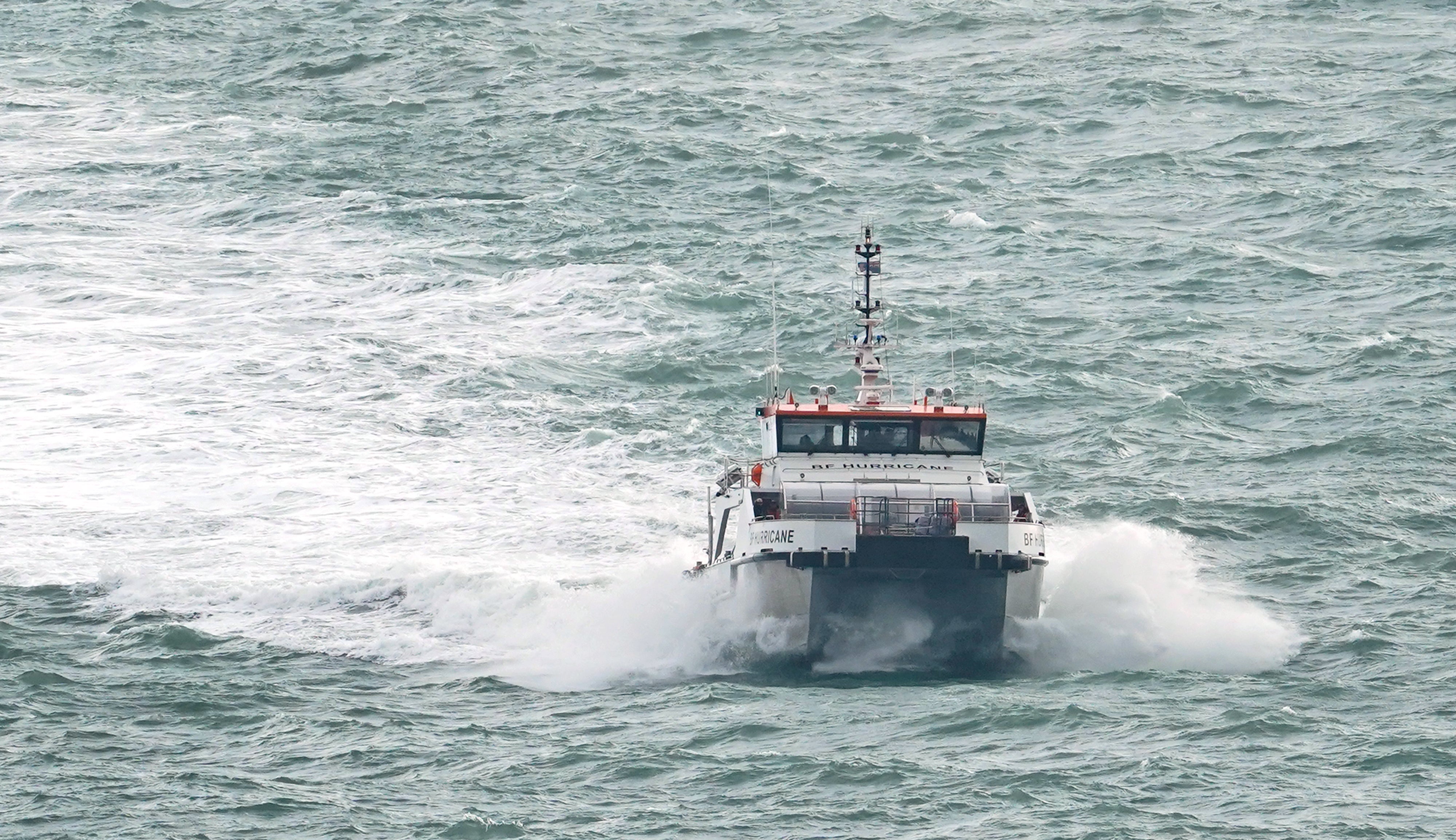 A group of people thought to be migrants are brought in to Dover, Kent, by a Border Force vessel