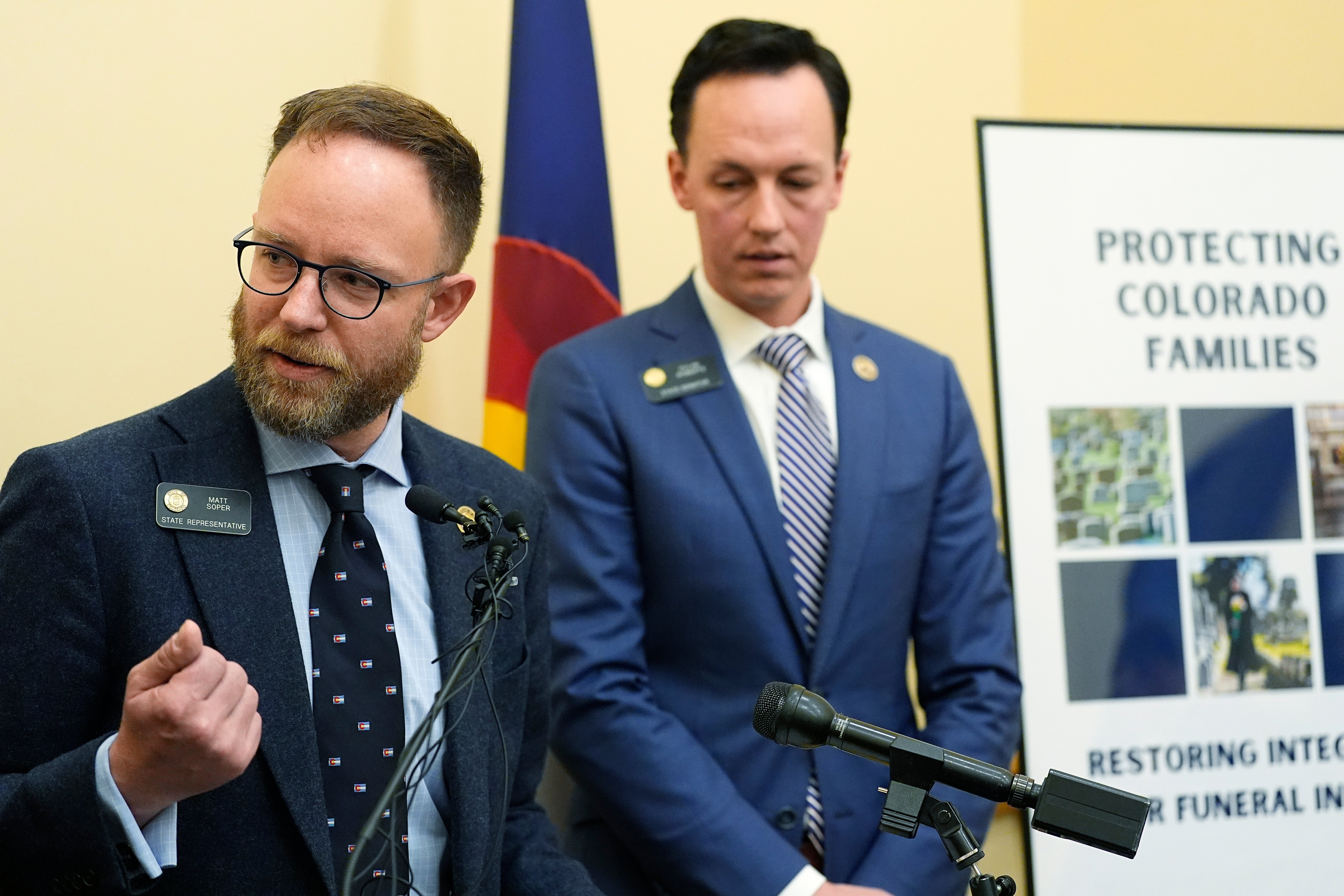 Republican Colorado State Rep. Matt Soper and Democratic Sen. Dylan Roberts appear at a March news conference to unveil bipartisan legislation to license funeral home professionals in Colorado; Soper tells The Independent that, when he first began delving into the issue, ‘I could not believe how few rules there were in this space’