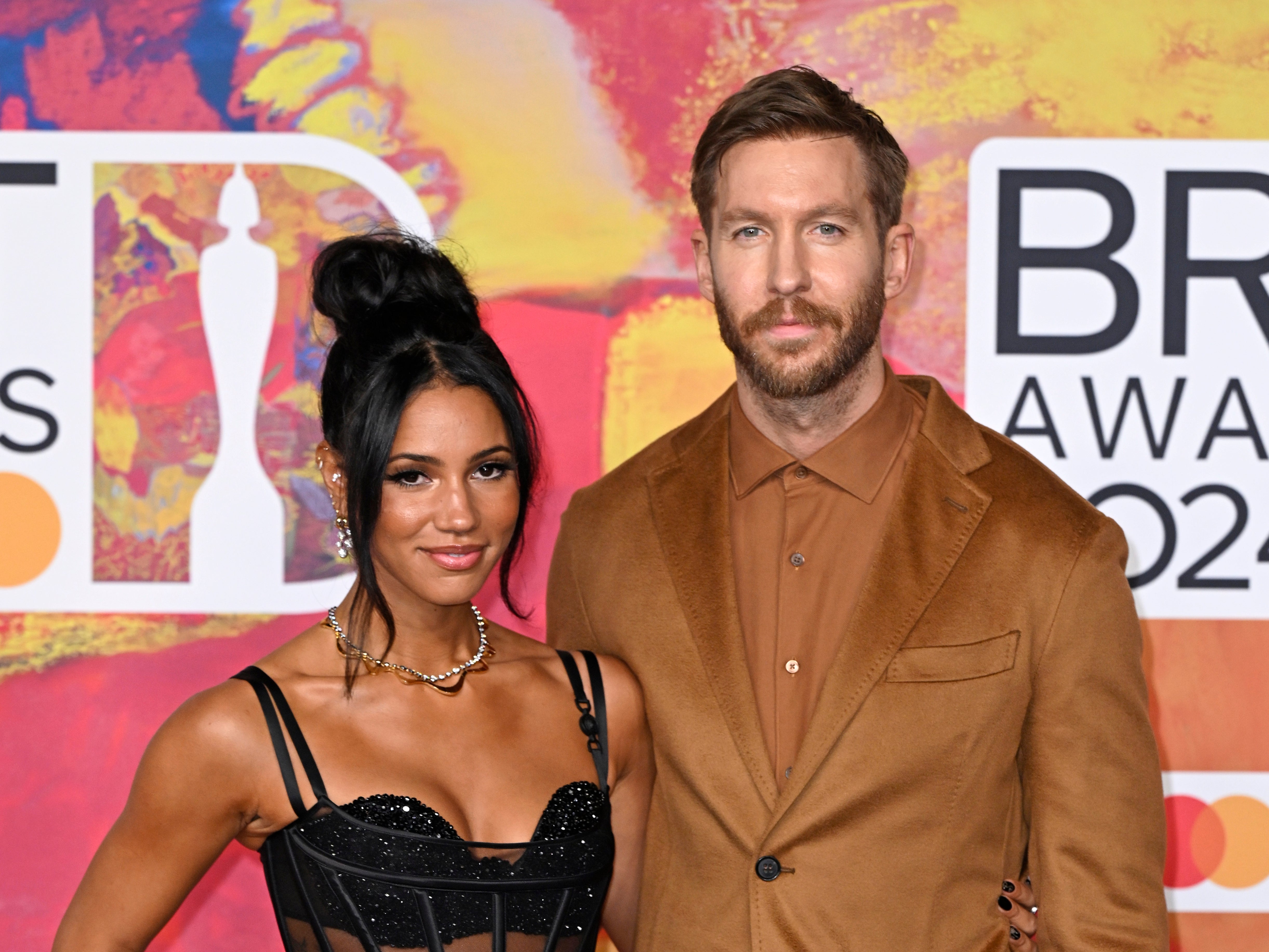 Calvin Harris and his wife, radio presenter Vick Hope, at the 2024 Brit Awards