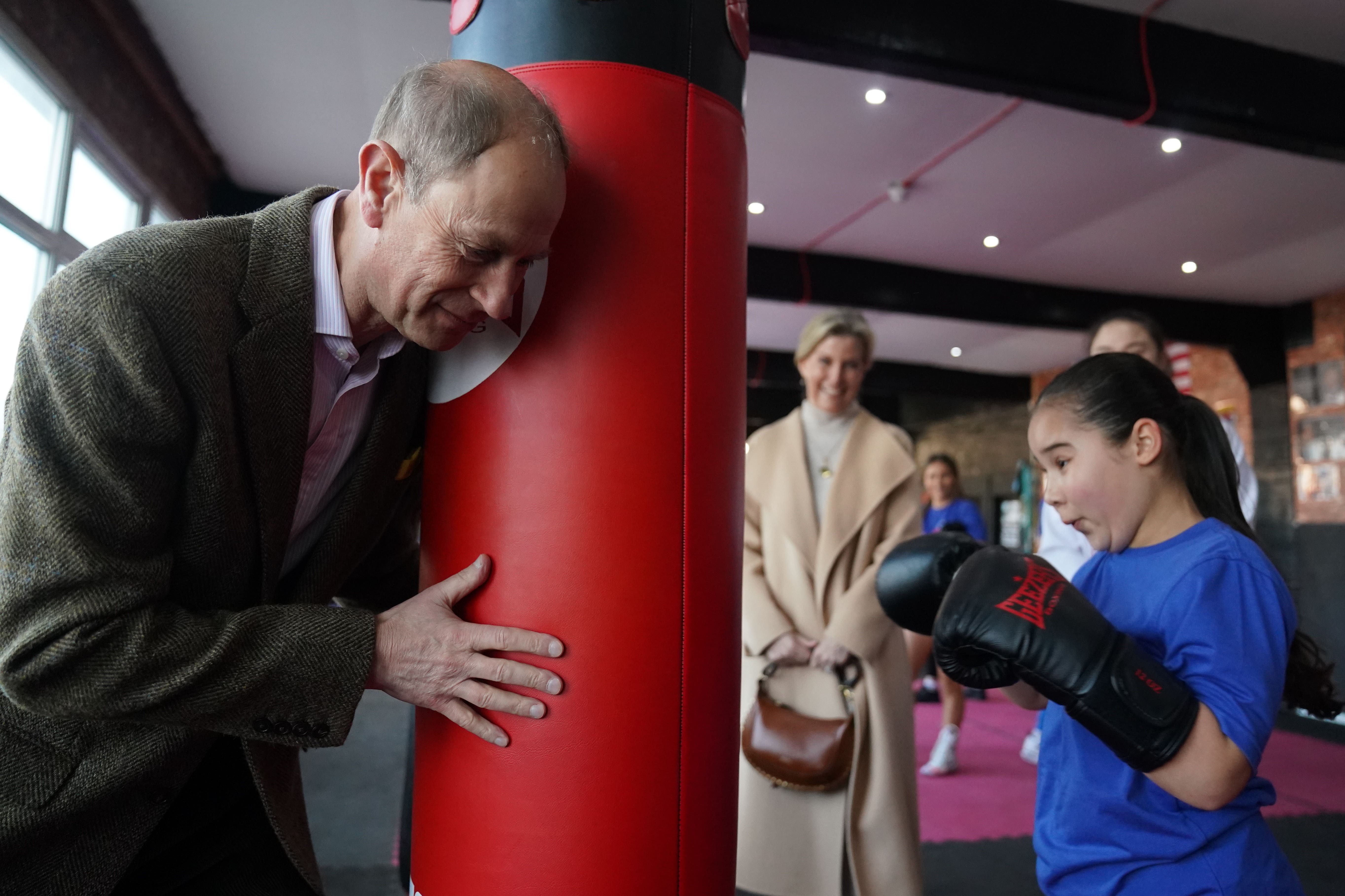 The Duchess of Edinburgh takes part in a sparring session with 11-year-old boxer Lacey Douglas during a visit to the Right Stuff Amateur Boxing Club in Stafford (Jacob King/PA)