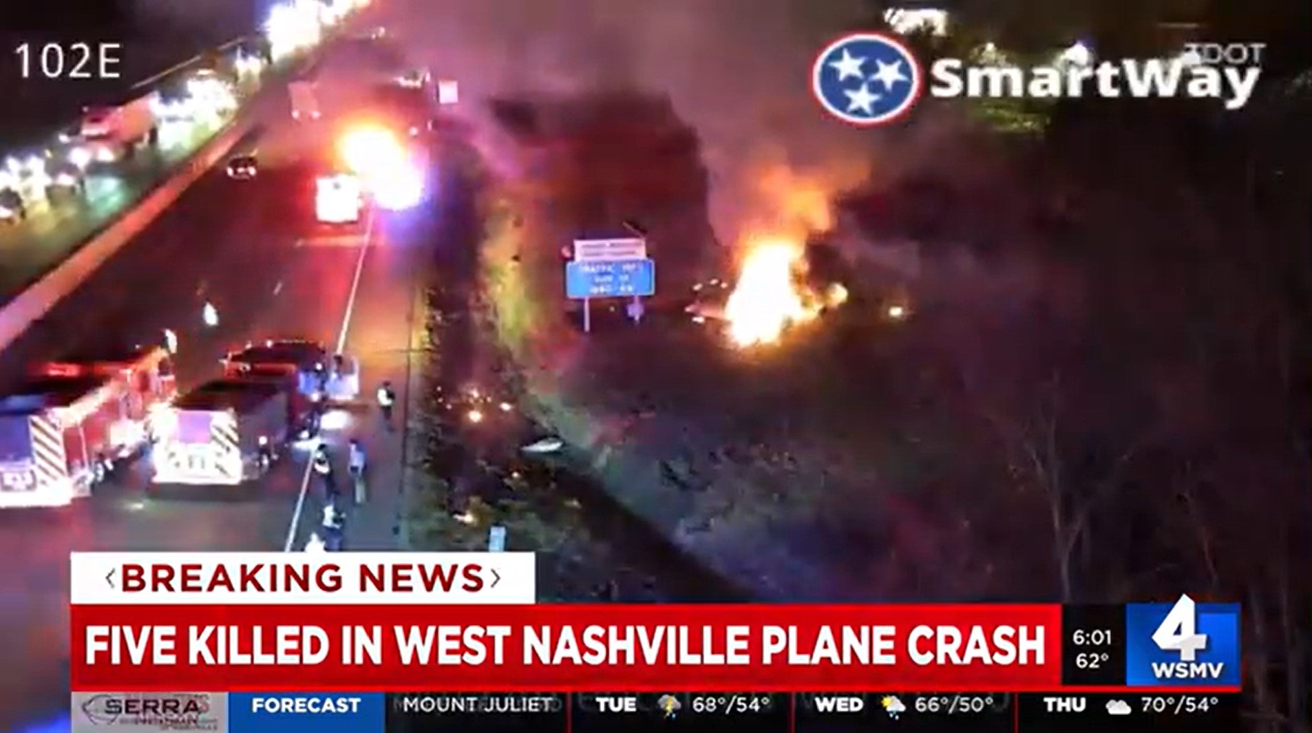 Flames seen at the side of the I-40 in Nashville, Tennessee following the plane crash