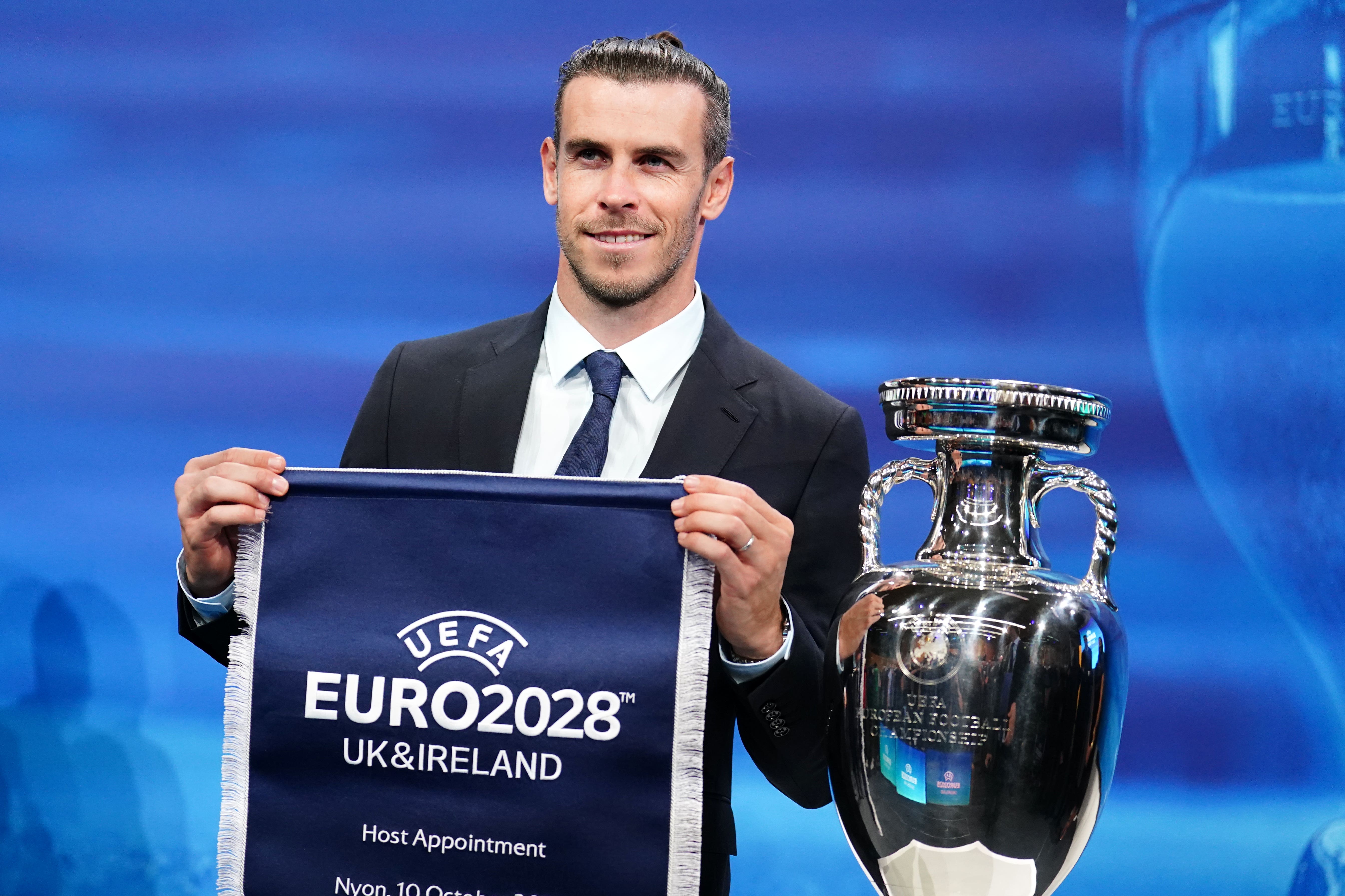 Wales delegate Gareth Bale holds a UEFA Euro 2028 pennant (Mike Egerton/PA)