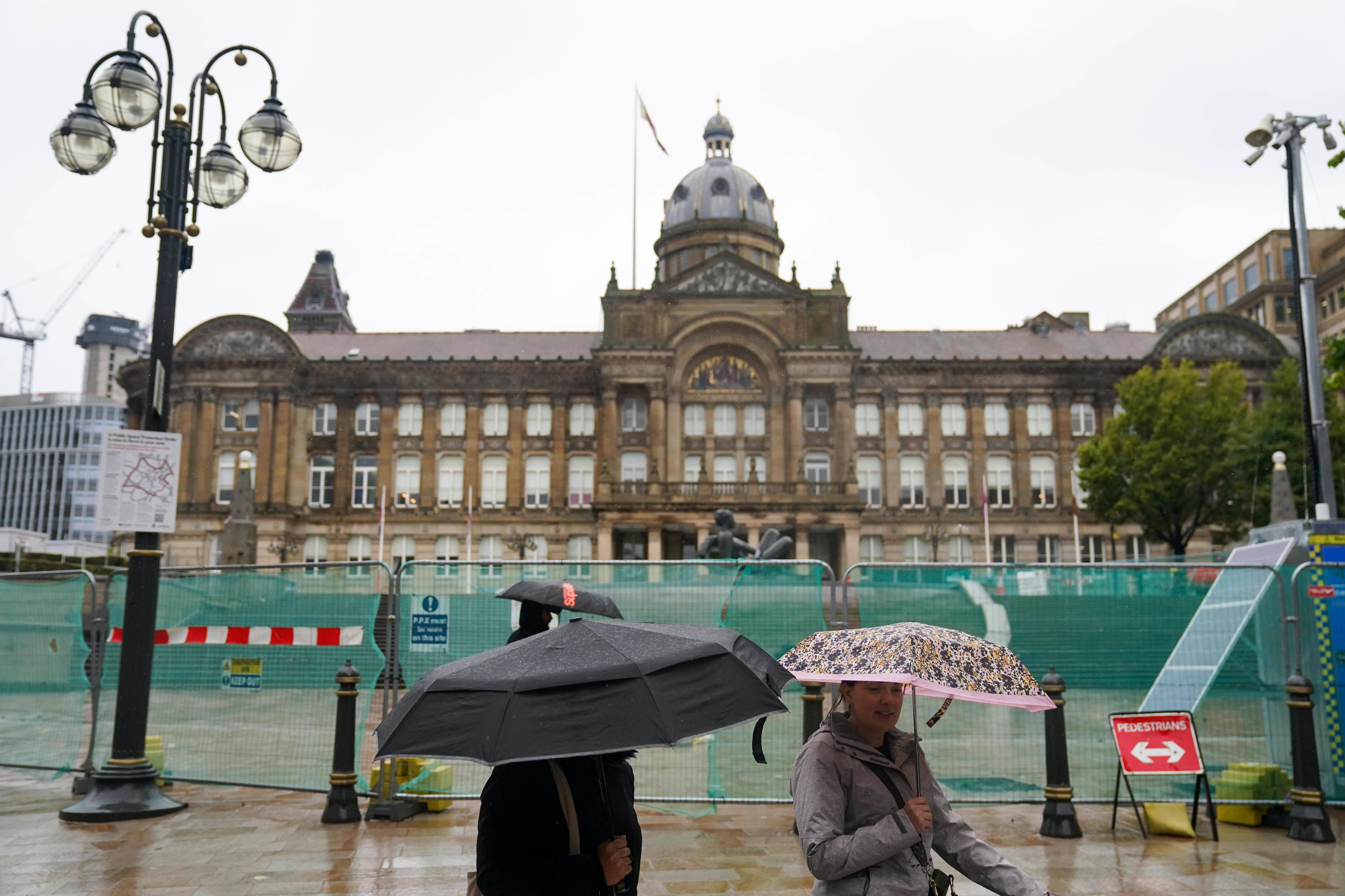 People walk by Victoria Square, Birmingham (PA)