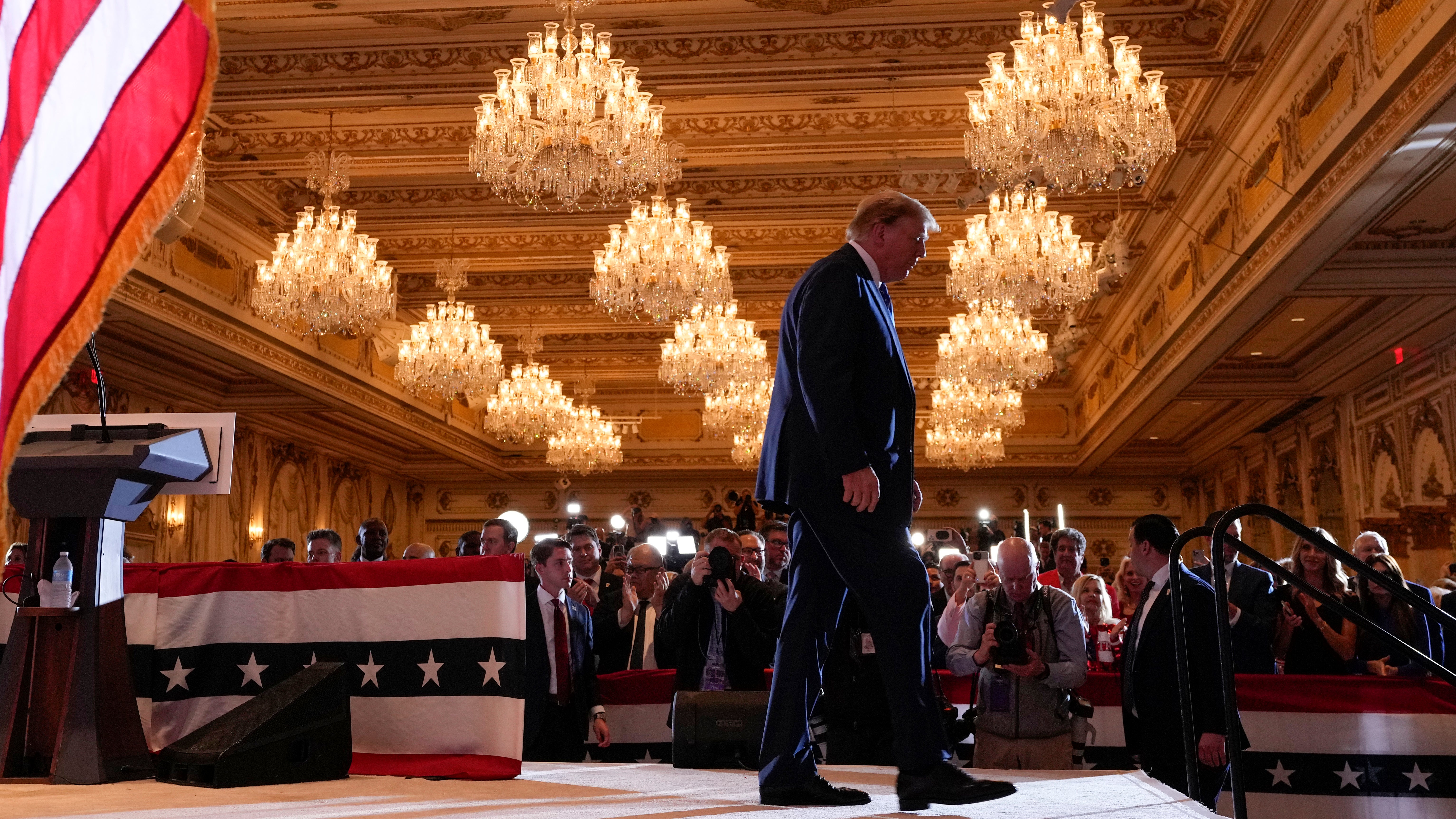 Donald Trump departs after speaking at his Super Tuesday election night party