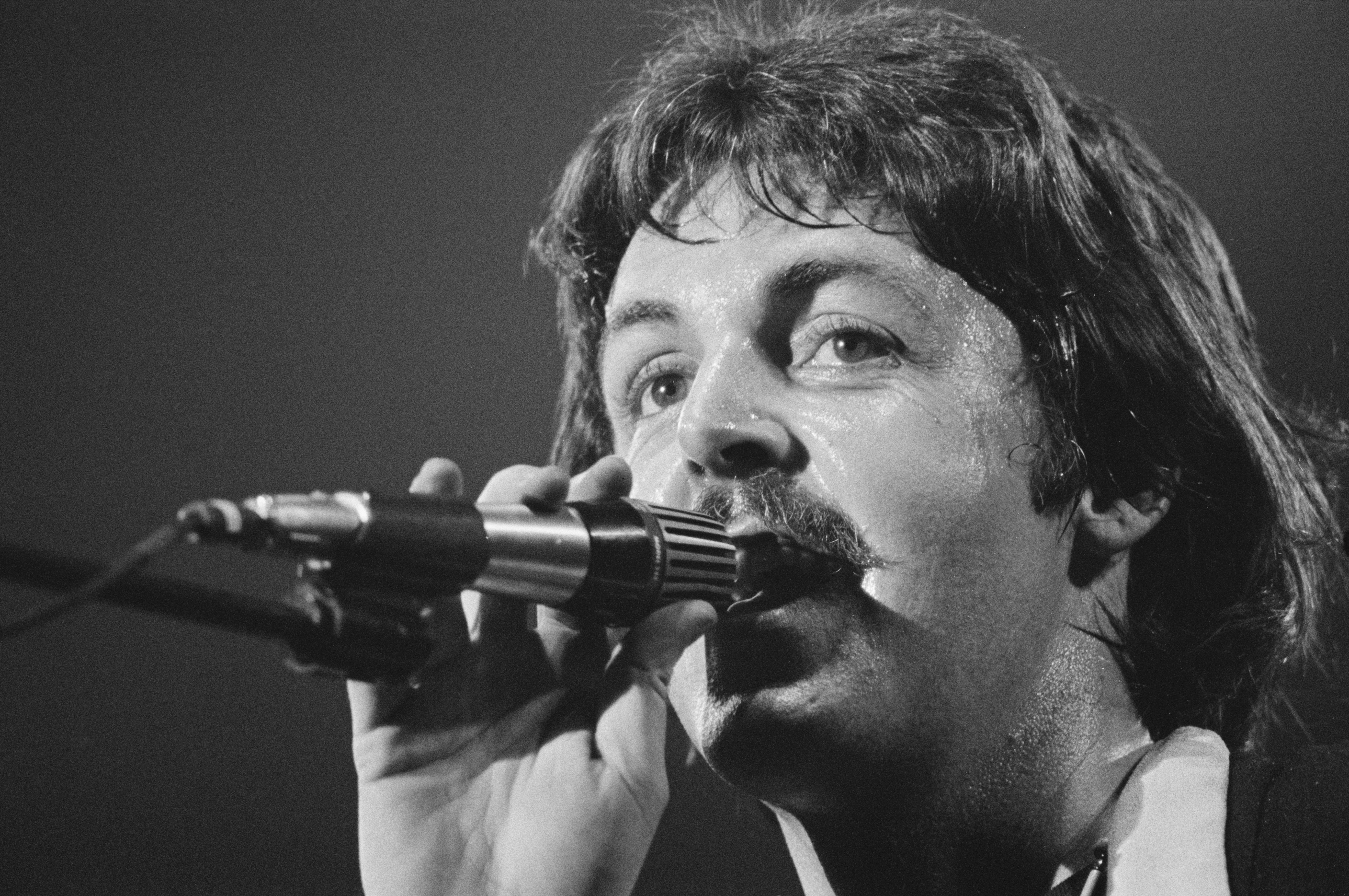 Paul McCartney (pictured in 1976) was convinced to keep the lyric by his bandmate, John Lennon