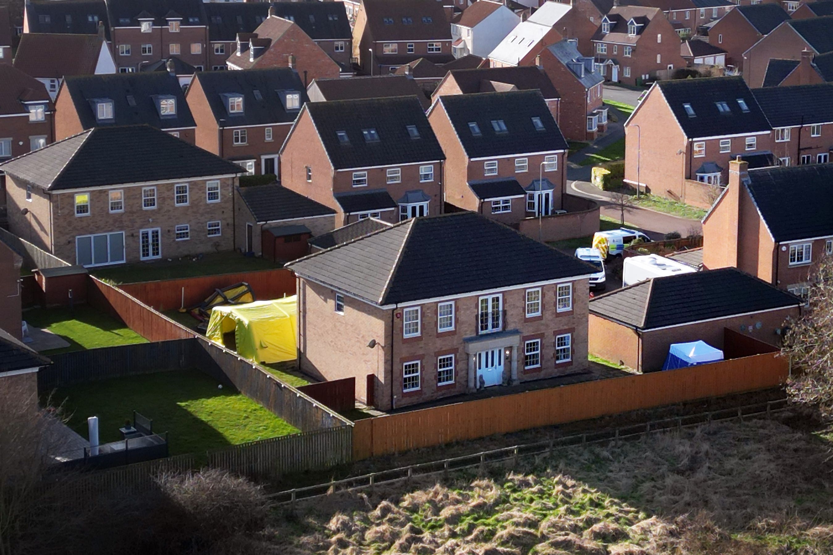 A major operation was carried out at a property in Ingleby Barwick, Teesside, after GP Thomas Kwan was charged with attempted murder (Owen Humphreys/PA)