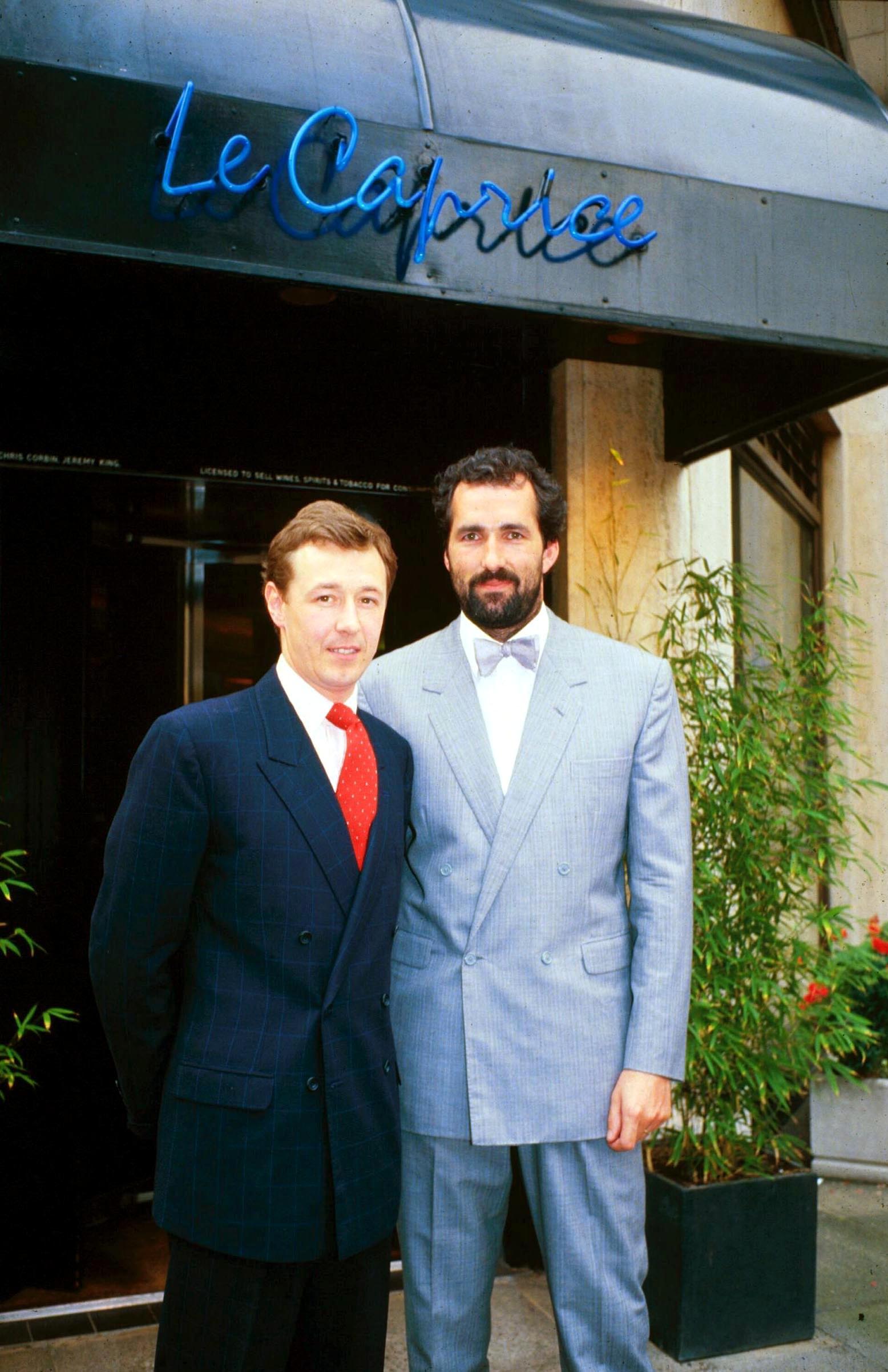 Corbin and King outside Le Caprice in 1985