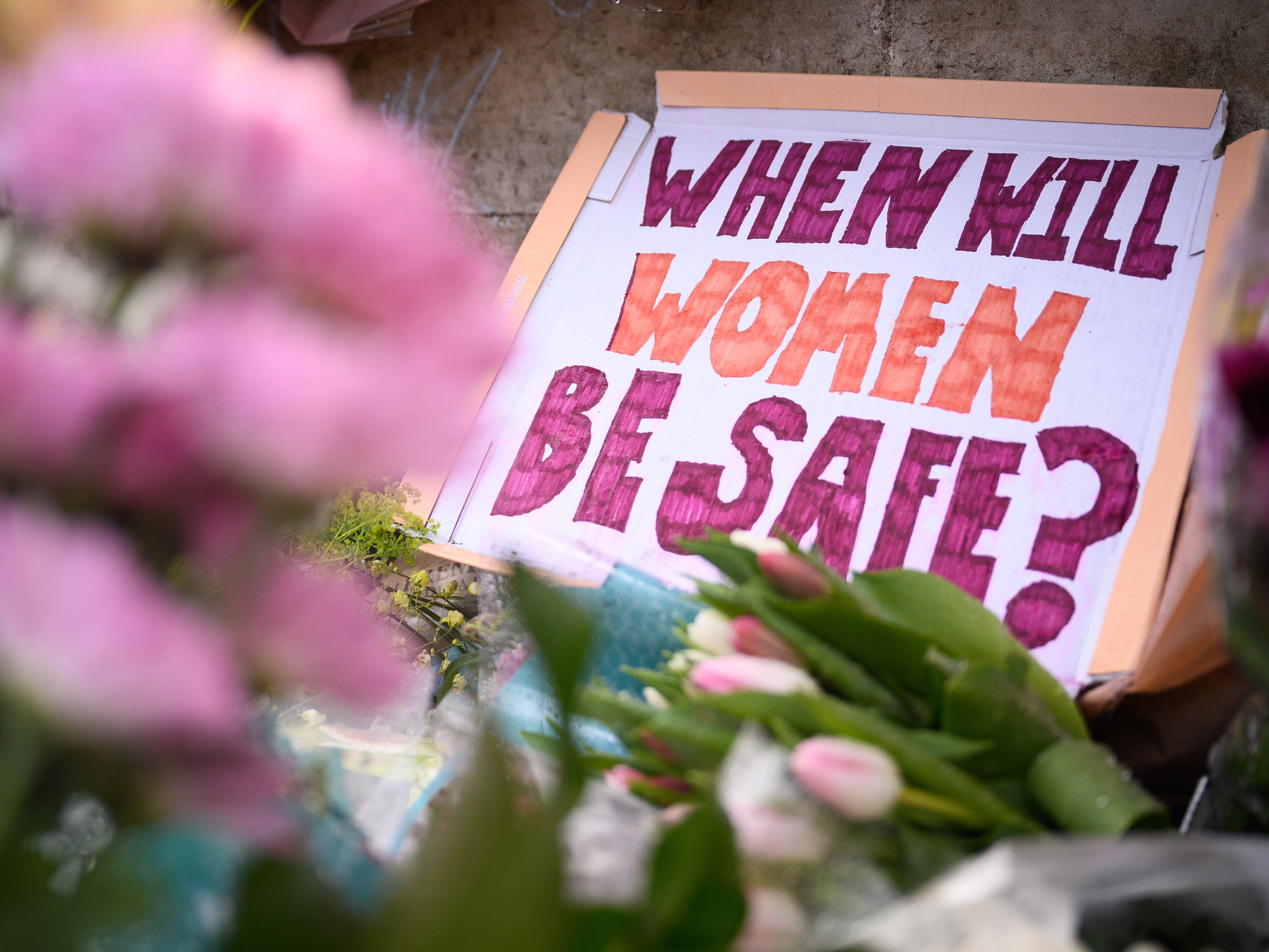 A sign left by mourners at a memorial for Sarah Everard