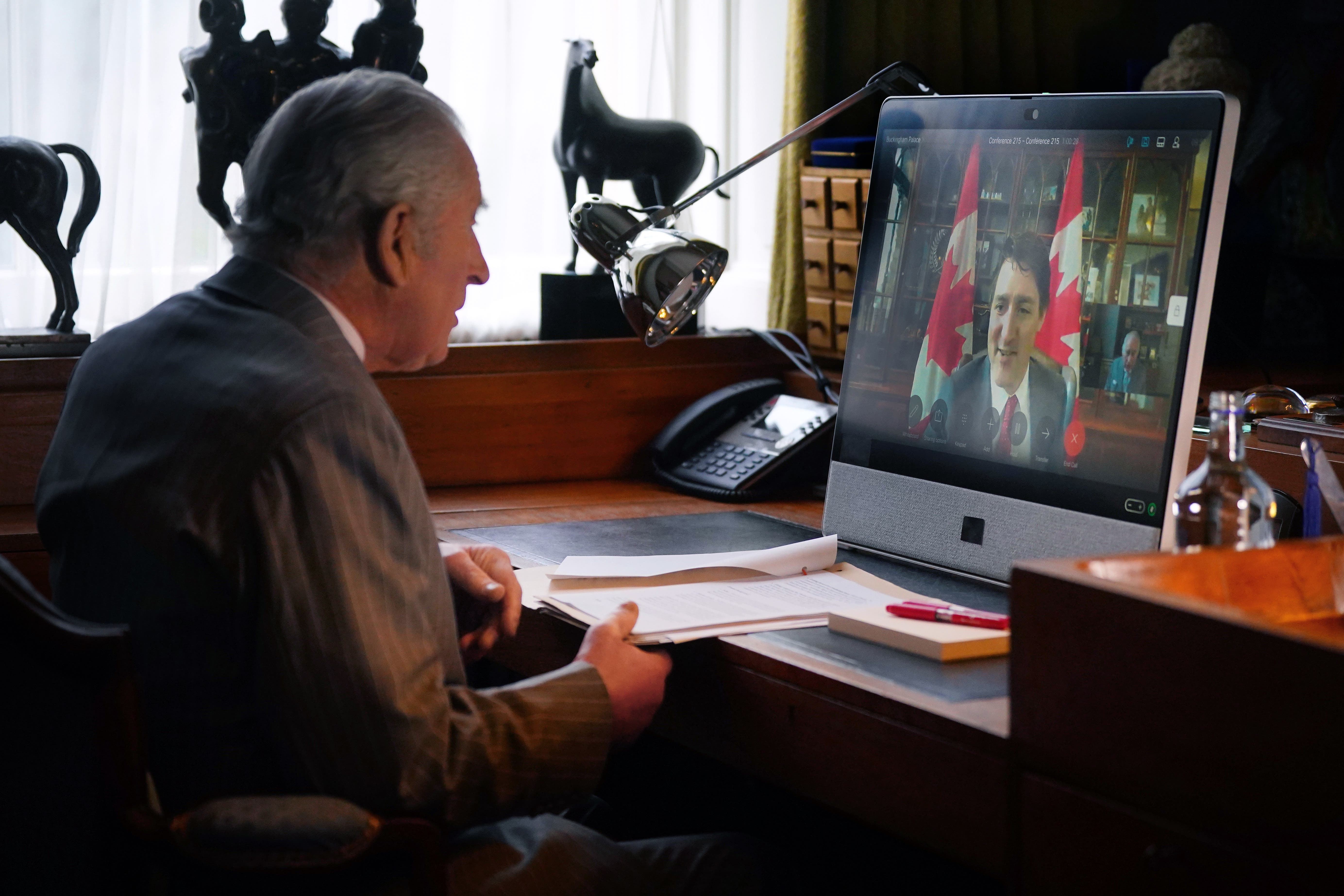 The King speaks to Canadian Prime Minister Justin Trudeau via videolink (Victoria Jones/PA)