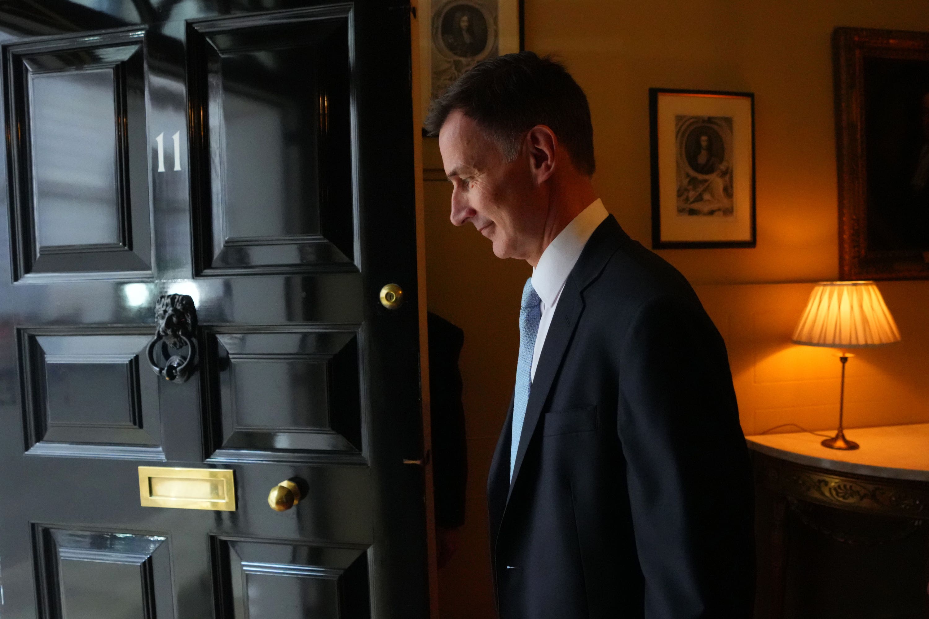 Chancellor of the Exchequer Jeremy Hunt exits 11 Downing Street ahead of delivering his Budget