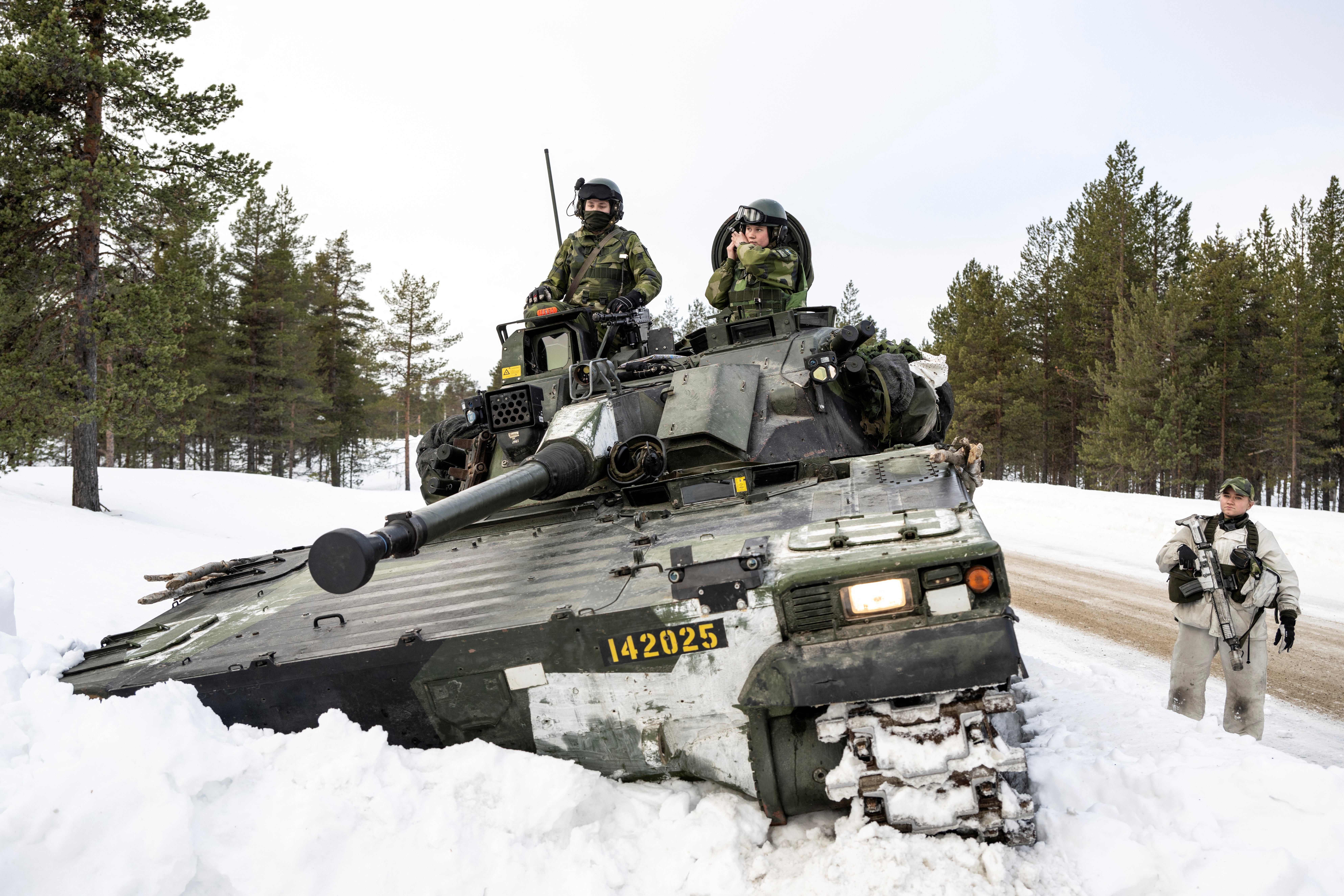 Swedish soldiers operate on a Combat Vehicle 90 during training with Finnish hunting units as part of Nato’s Nordic Response exercise