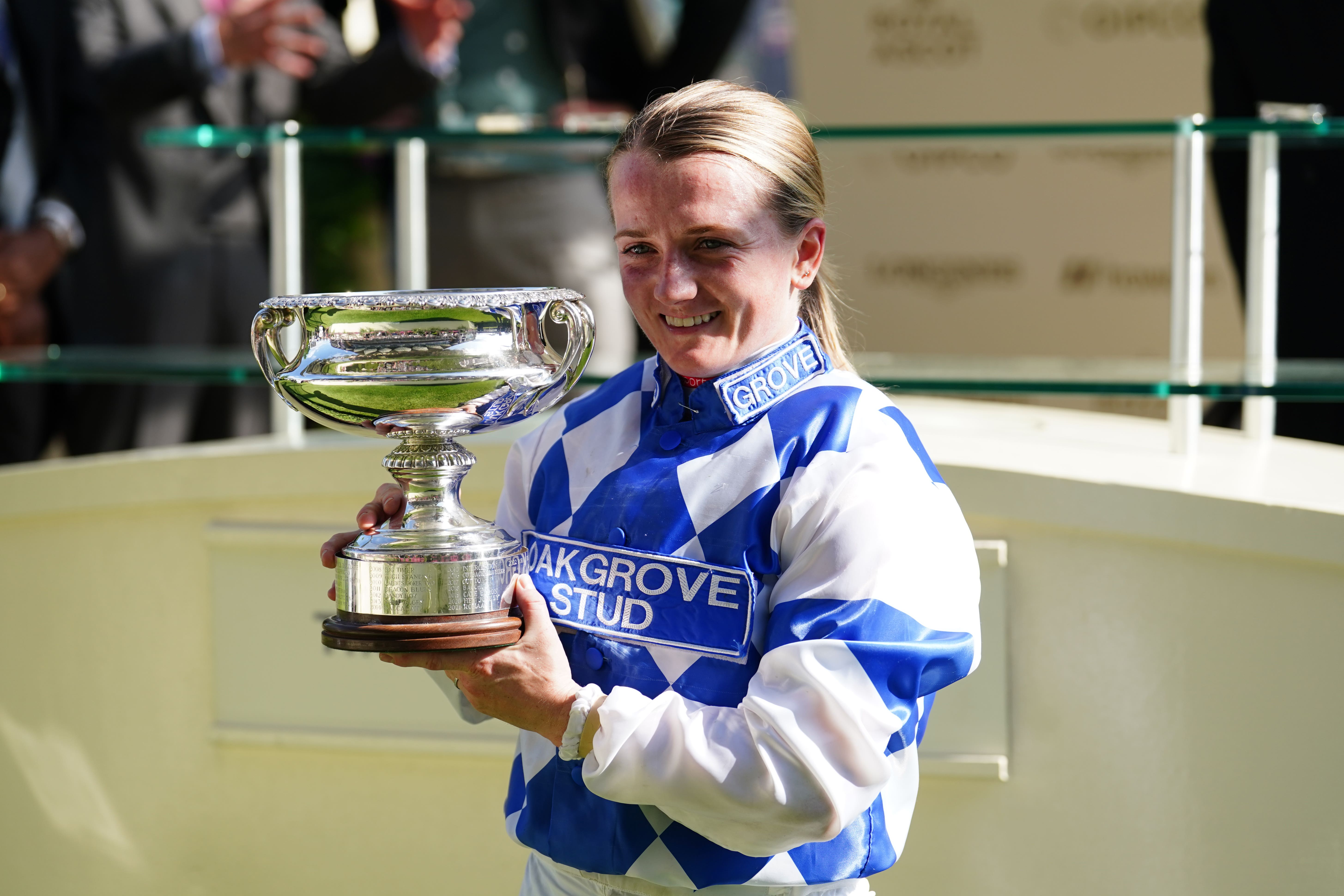 Jockey Hollie Doyle poses with the trophy after winning the Wokingham Stakes on Spirit of Light during day five of Royal Ascot (David Davies/PA)