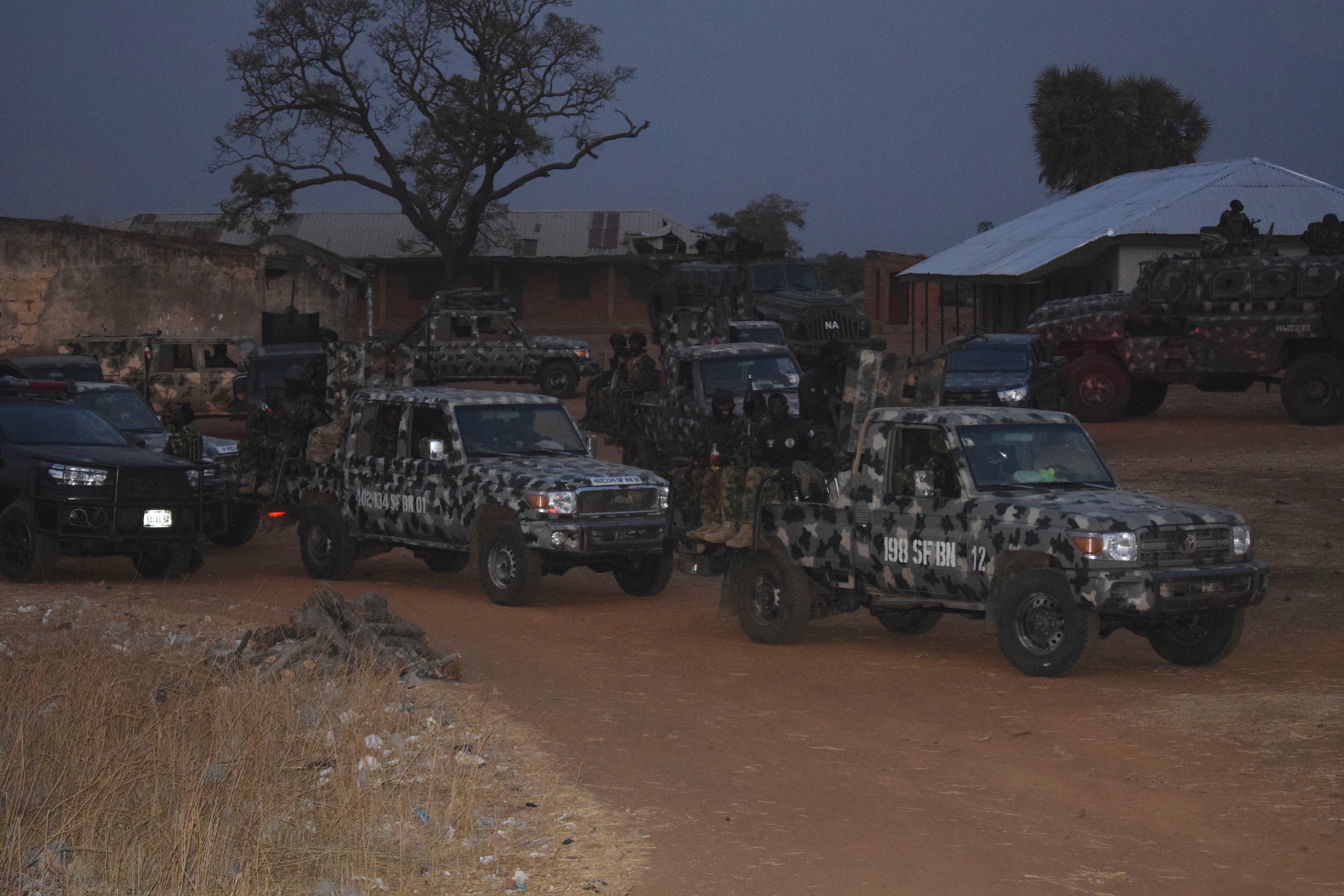 Nigeria army trucks are park in an area were gunmen kidnapped school children in Chikun, Nigeria, Thursday, 7 March, 2024