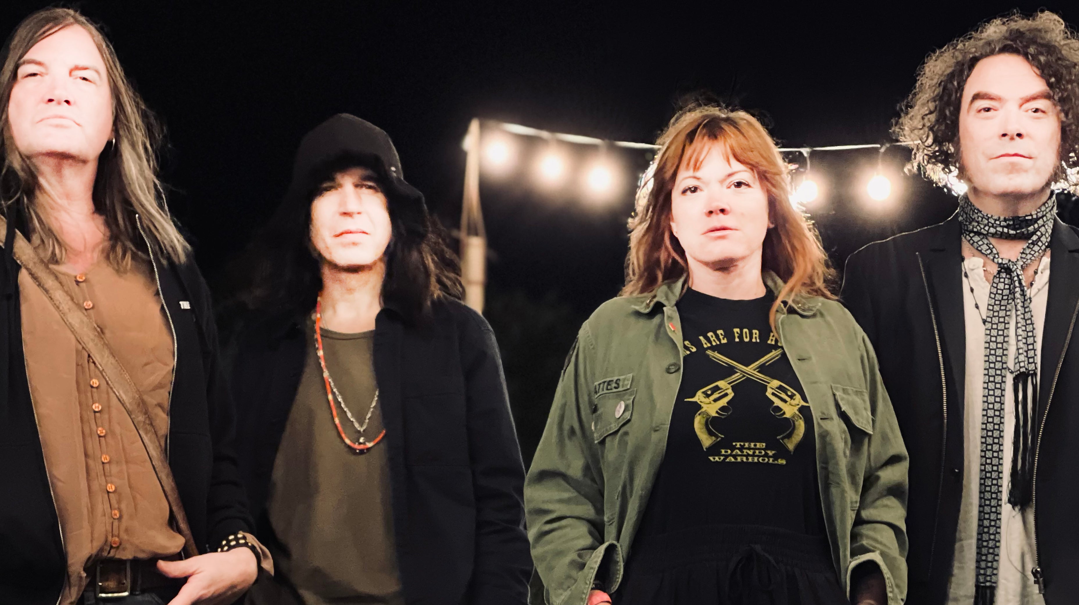 The Dandy Warhols: vocalist Taylor-Taylor, keyboardist Zia McCabe, guitarist Peter Holmström, and drummer Brent DeBoer