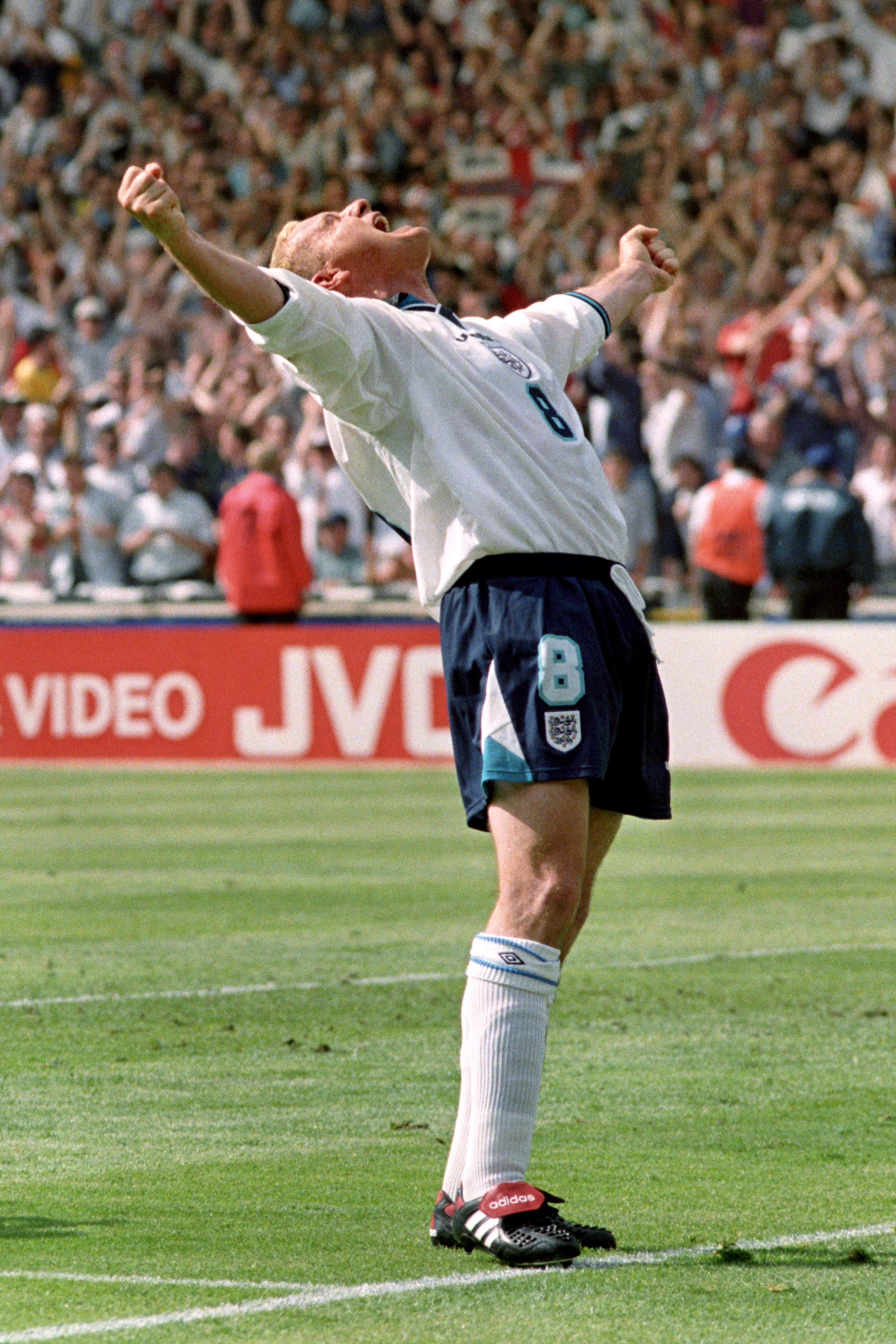 Gascoigne celebrates scoring against Scotland