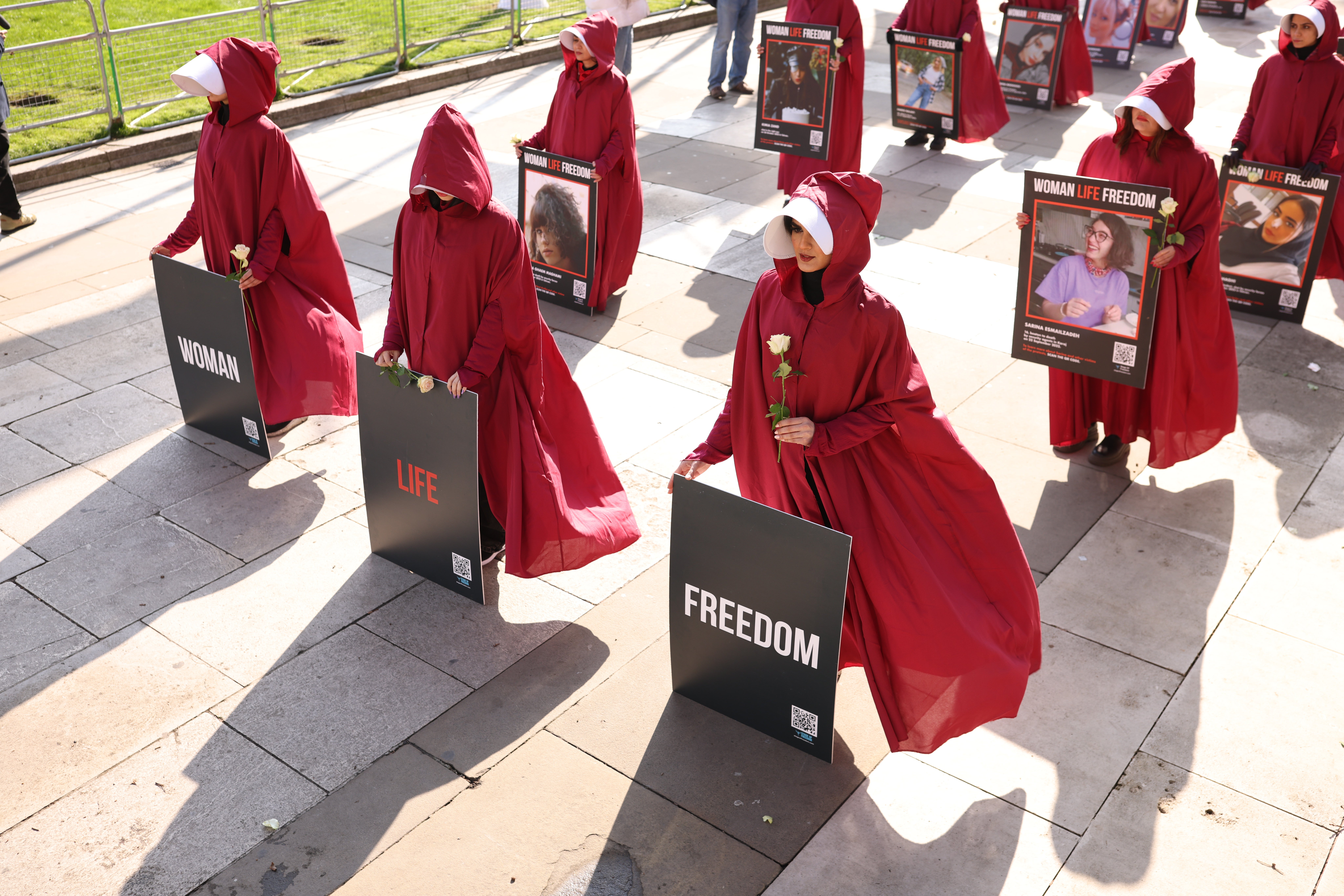 Campaigners for women’s rights have been dressing up as handmaids on marches