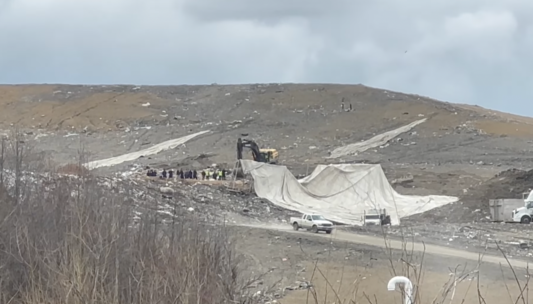 Authorities were spotted combing through the landfill where the trash from the teen’s neighbourhood ended up