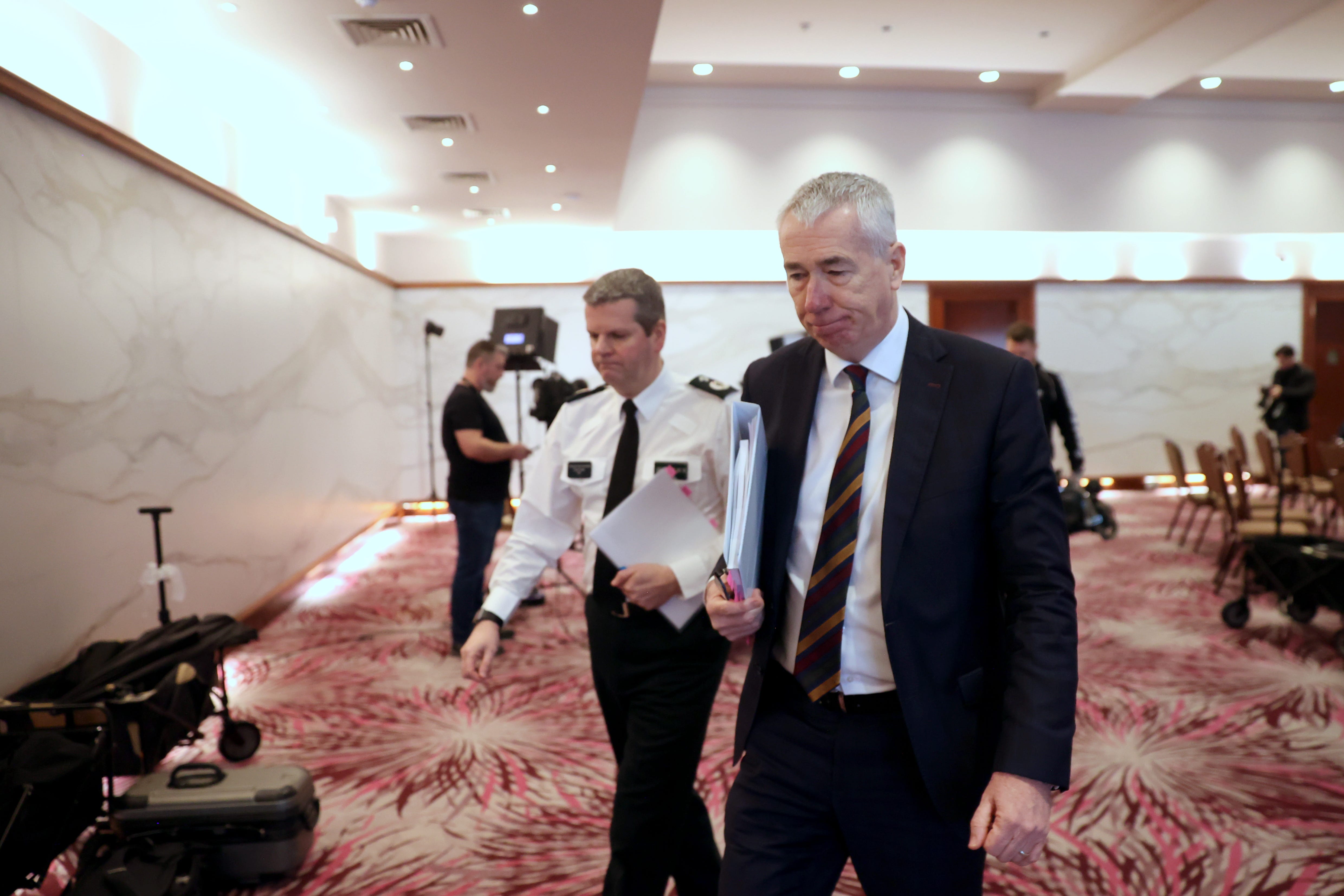 Chief Constable Jon Boutcher (right) and Temporary Deputy Chief Constable Chris Todd, leave the press conference at Stormont Hotel in Belfast following the publication of the Operation Kenova Interim Report into Stakeknife, the British Army’s top agent inside the IRA in Northern Ireland during the Troubles (Liam McBurney/PA)