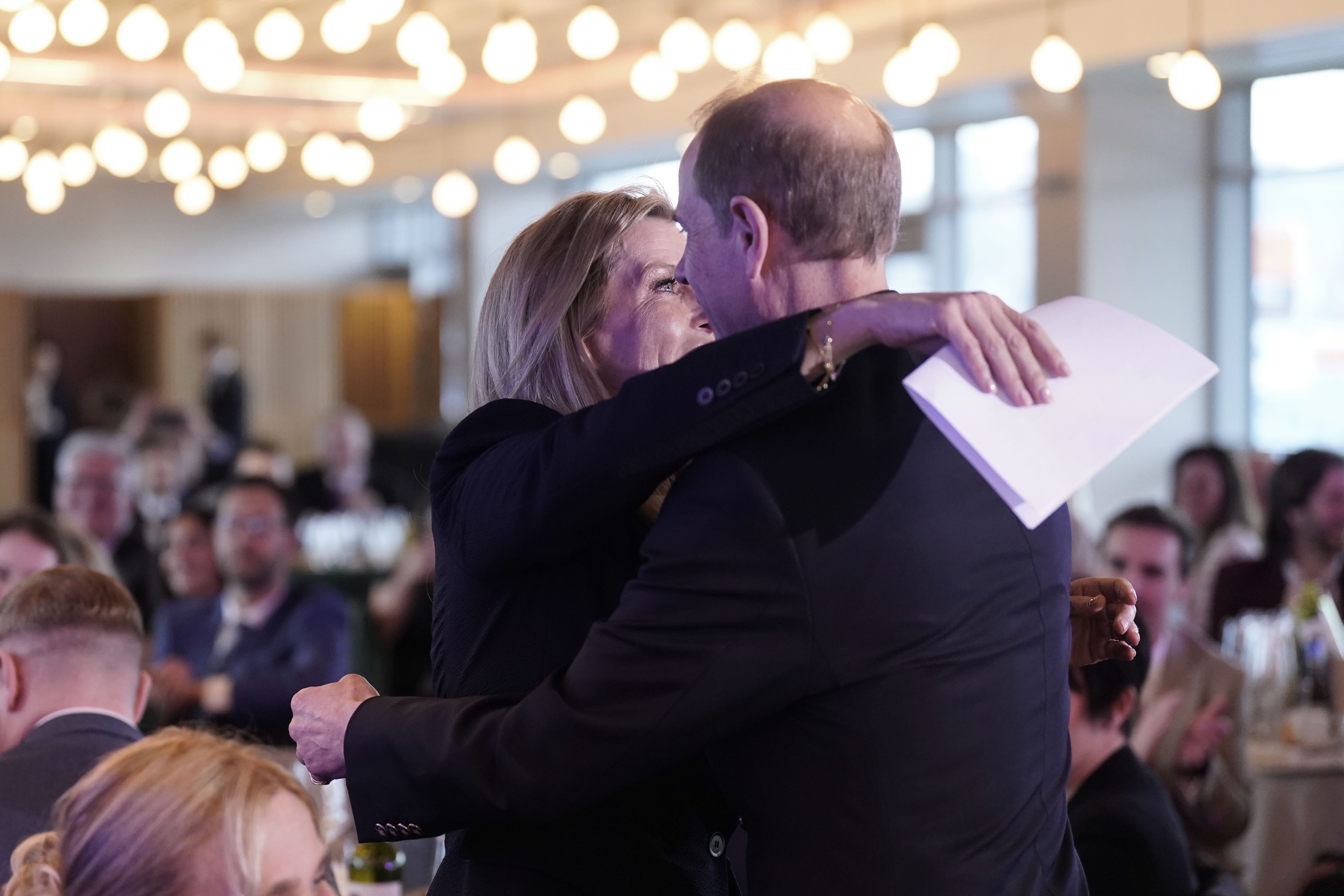 The Duke and Duchess of Edinburgh embrace (Danny Lawson/PA)