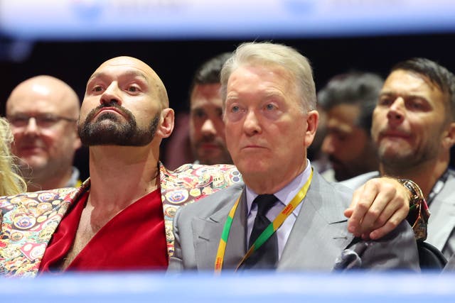<p>Tyson Fury (left) with his promoter Frank Warren</p>