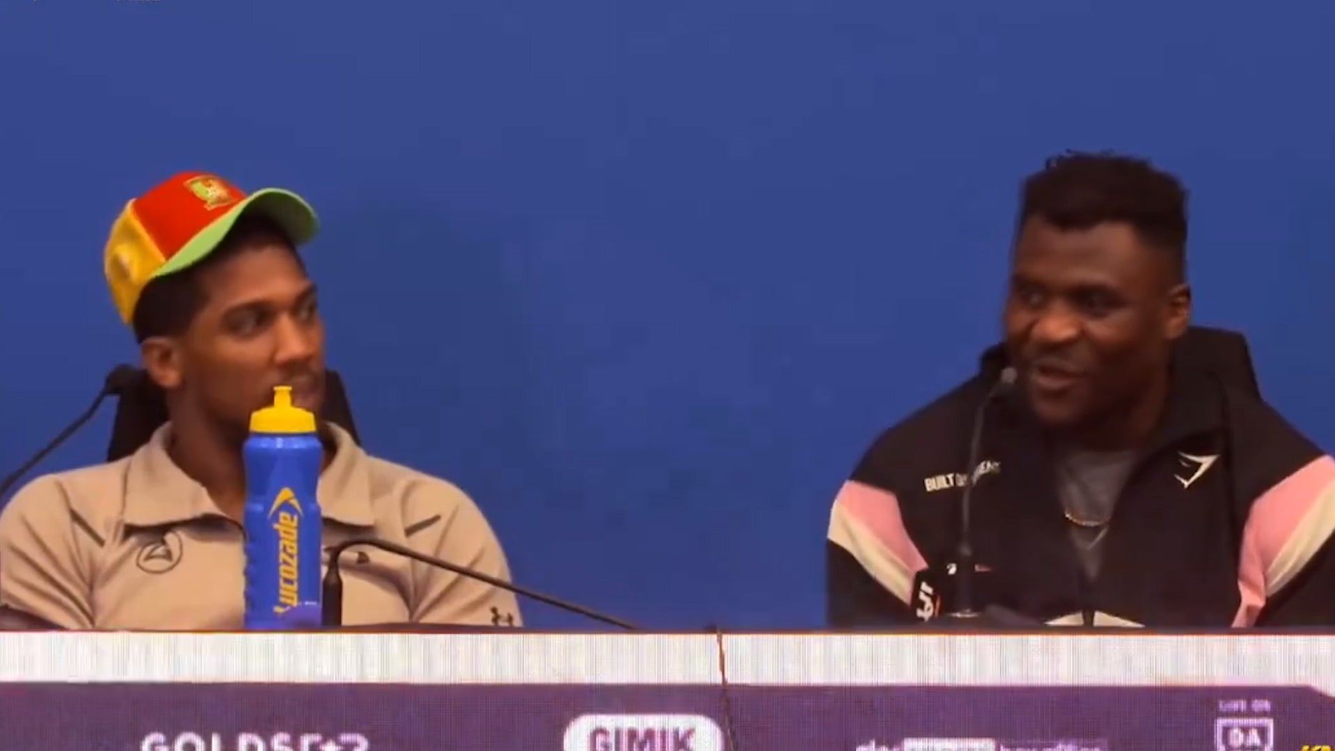 Joshua and Ngannou during their post-fight press conference