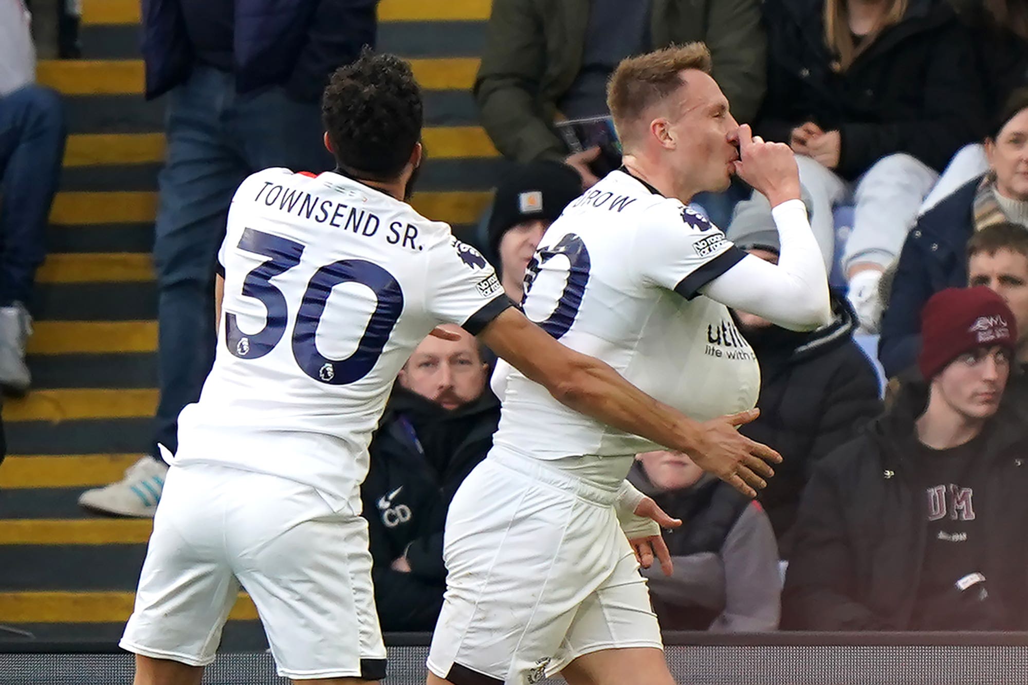 Luton’s Cauley Woodrow (right) celebrates scoring a late equaliser (Bradley Collyer/PA)