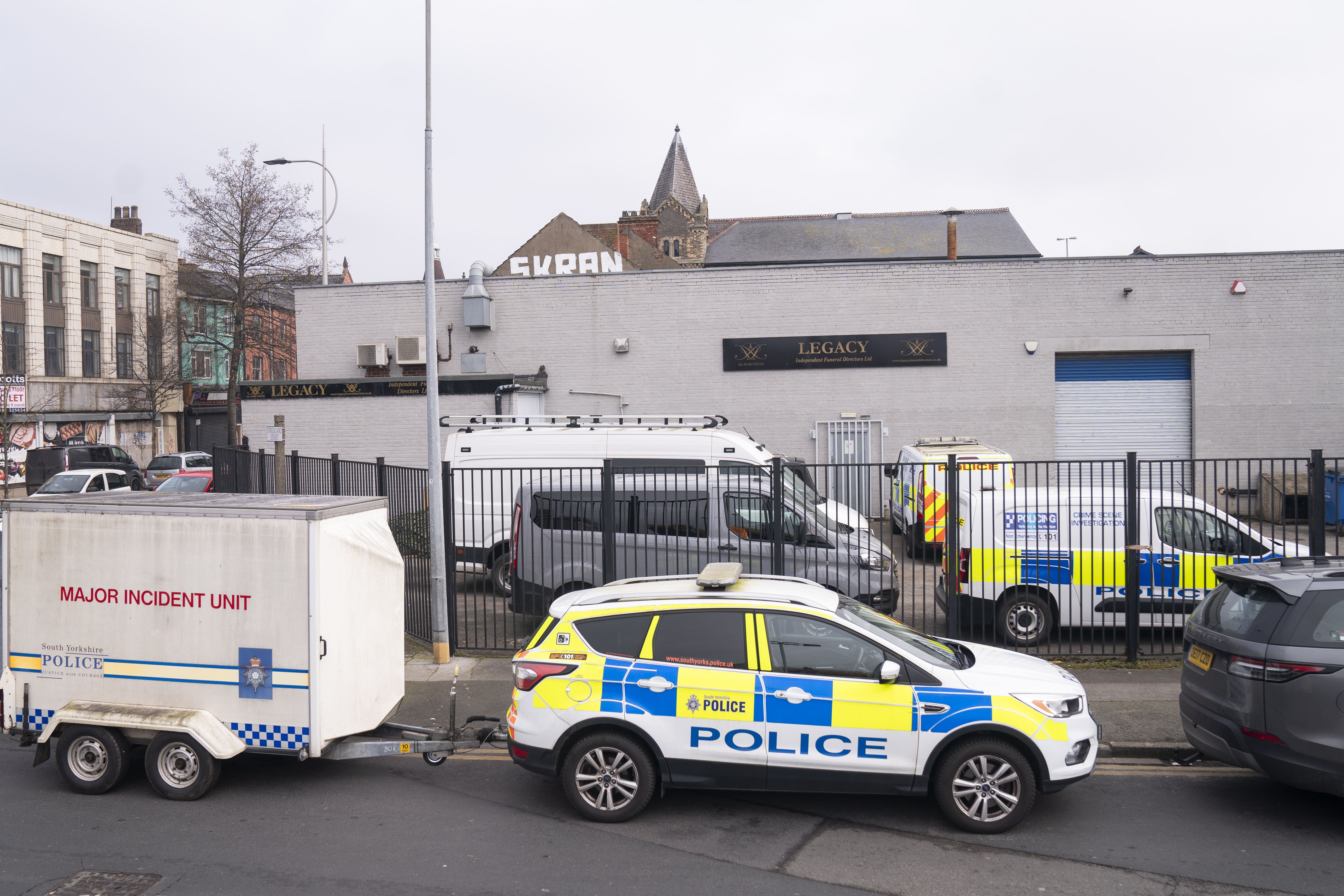 Police outside the Hessle Road branch of Legacy Independent Funeral Directors in Hull