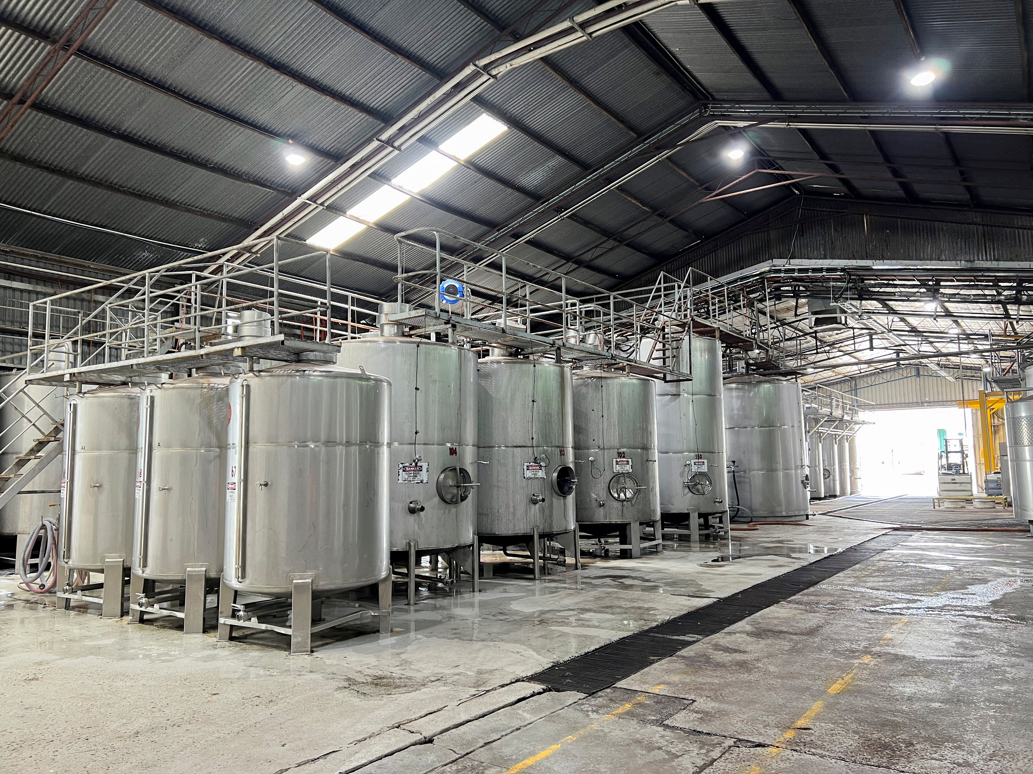 A view shows winemaking equipment at a Calabria Wines facility in the town of Griffith in southeast Australia