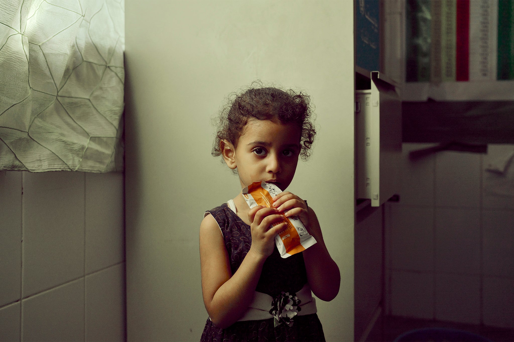 Four-year-old Ohood who lives in the community near the health centre at Dar Sa’ad. She has visited the WFP and QFFD funded facility numerous times along with her sister Fatima