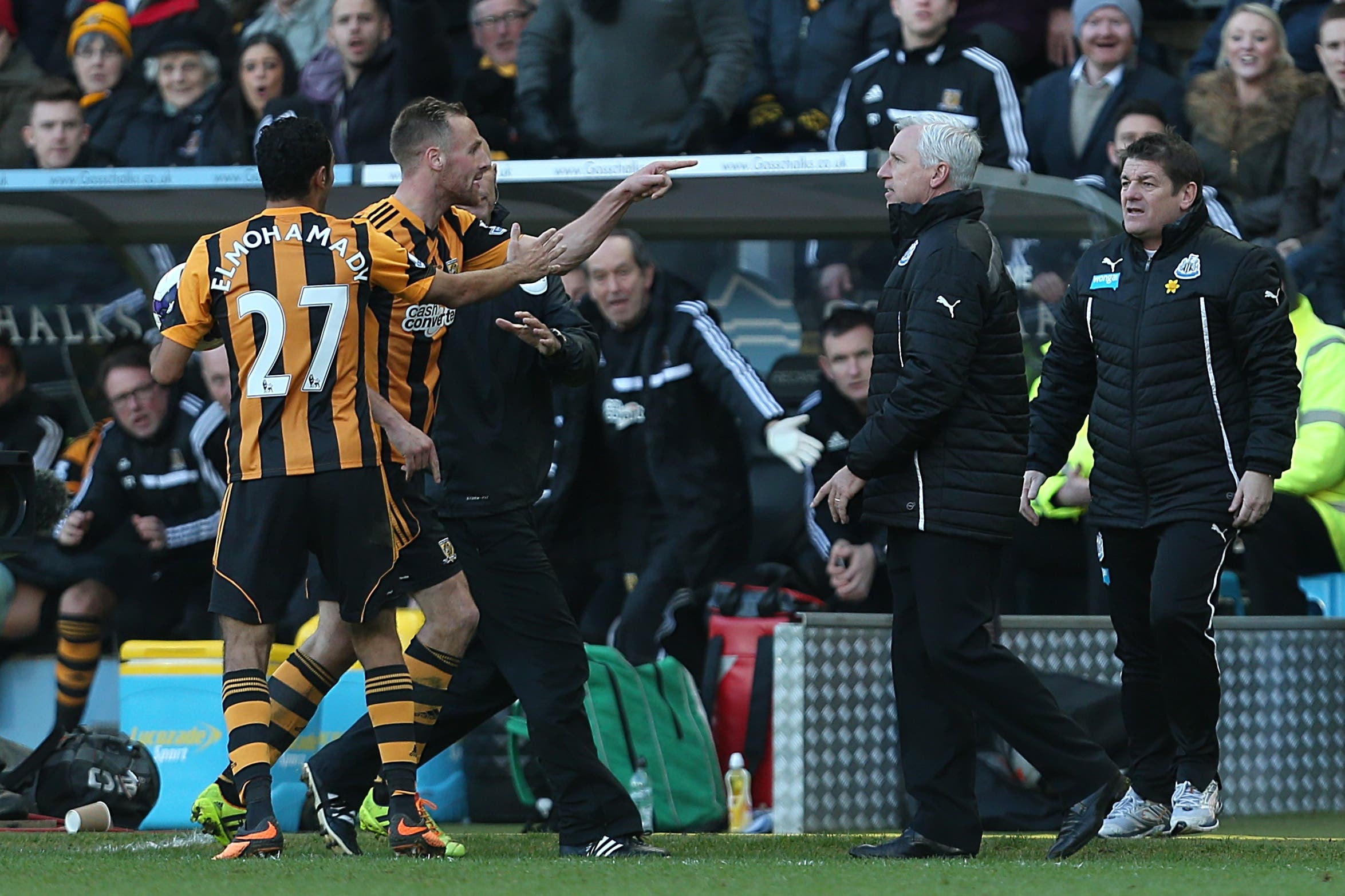 Alan Pardew, second right, was hit with a seven-game ban after his confrontation with David Meyler (Lynne Cameron/PA)