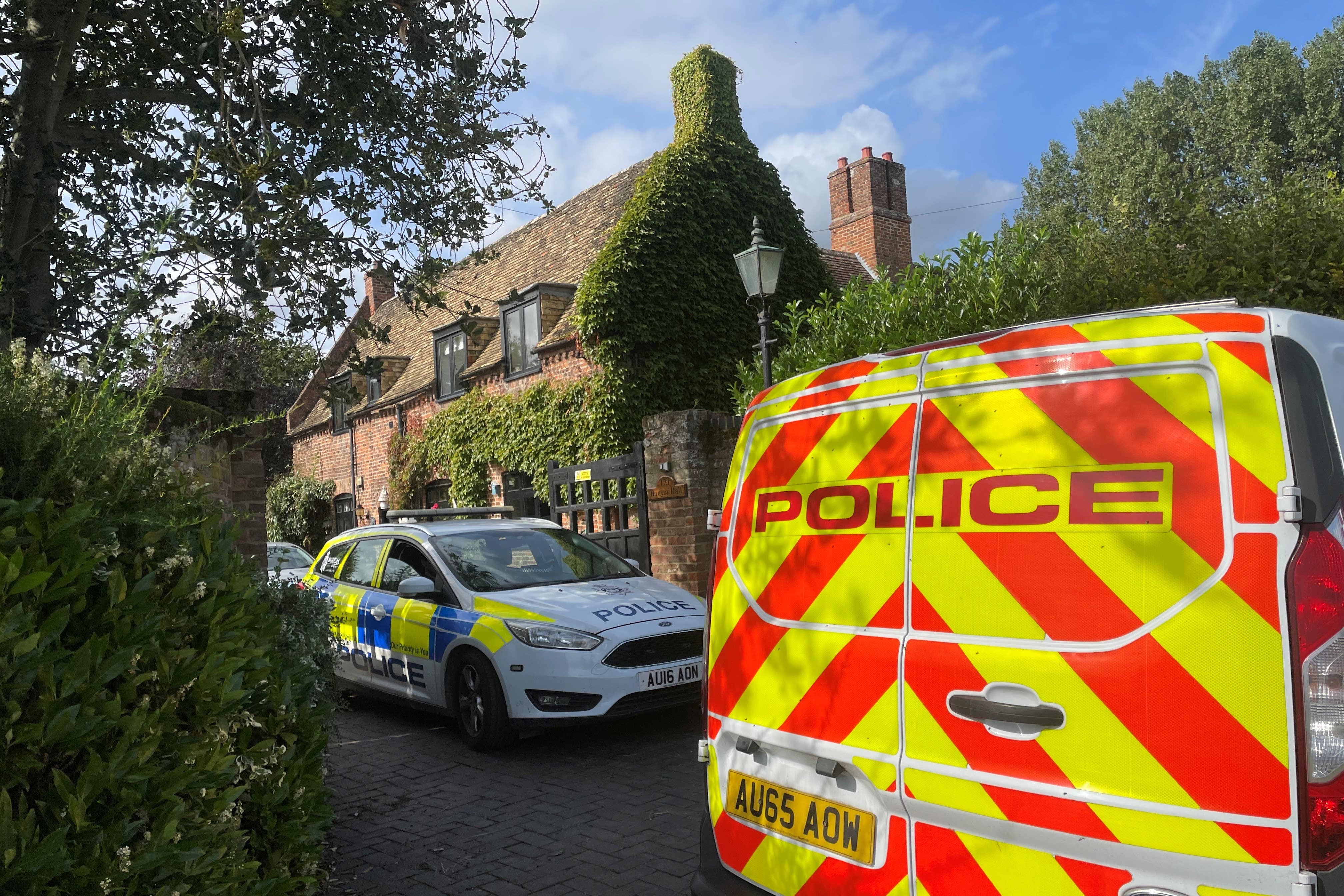 A property in Lady’s Drove, Emneth, Norfolk, is sealed off by police after a woman was found dead (Sam Russell/ PA)