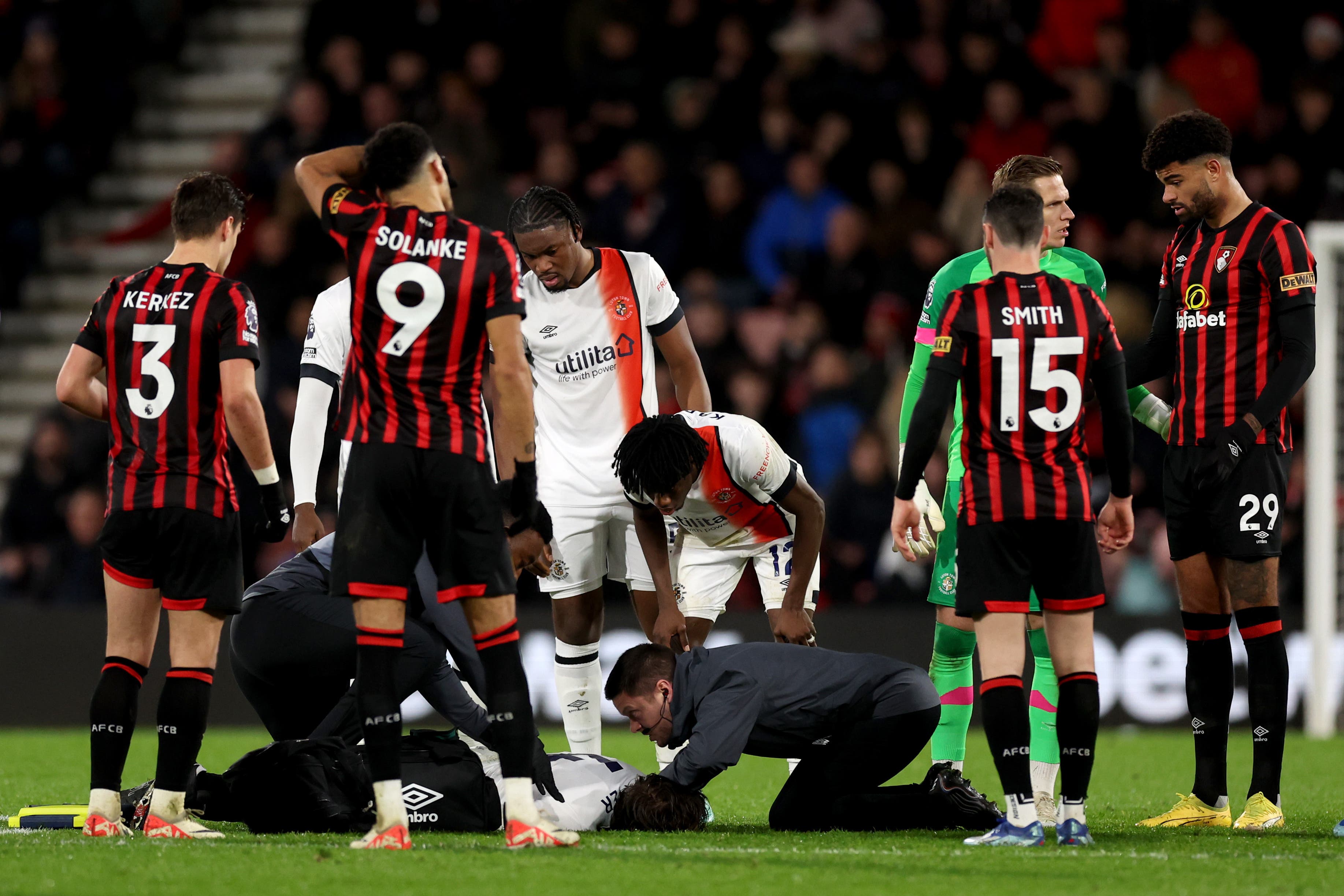 Luton defender Tom Lockyer received life-saving treatment on the pitch after collapsing (Steven Paston/PA)