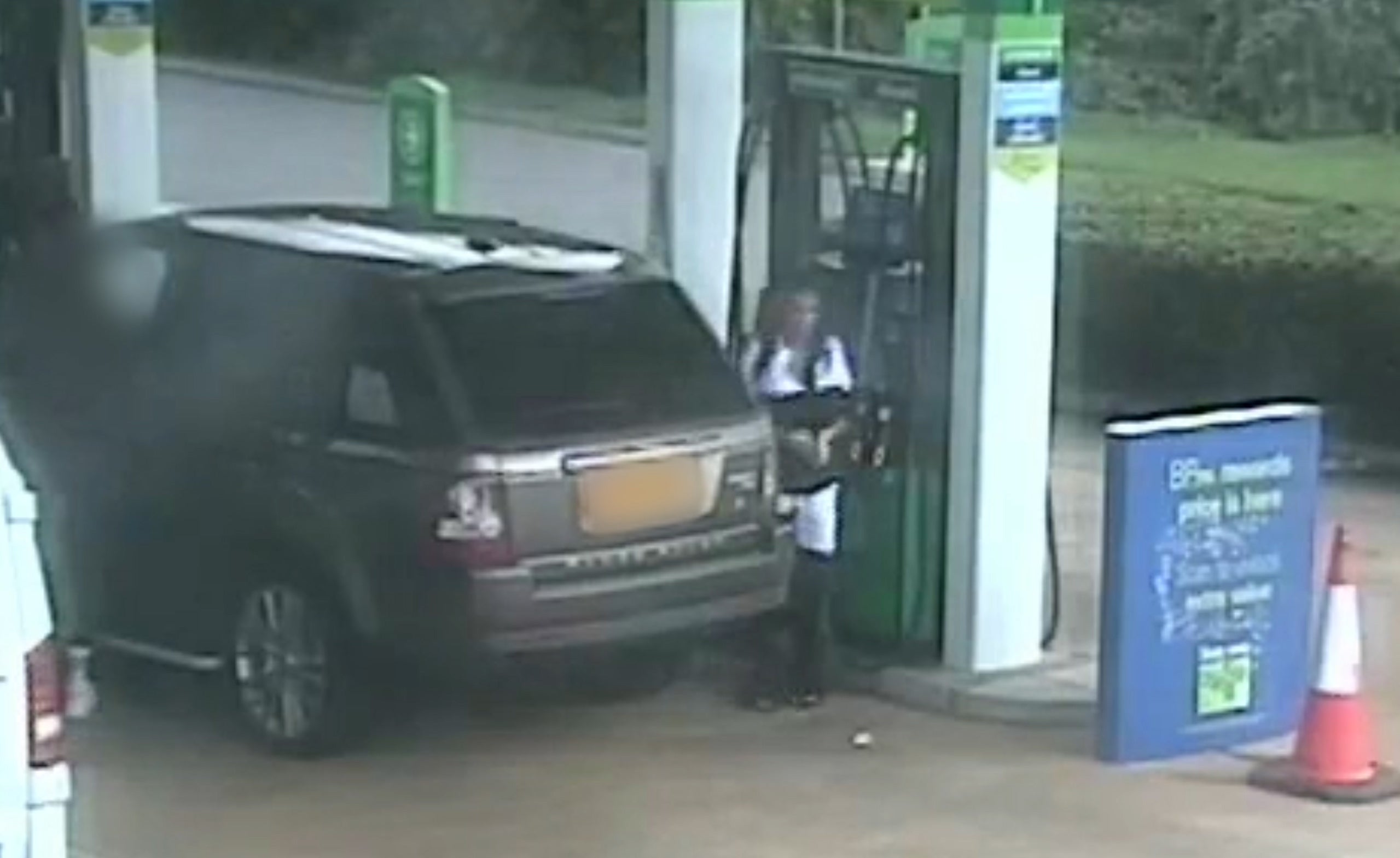 Handout still taken from CCTV issued by Northamptonshire Police of Reality TV star Katie Price at a petrol station after stepping out of the driver's side of her bronze-coloured Range Rover