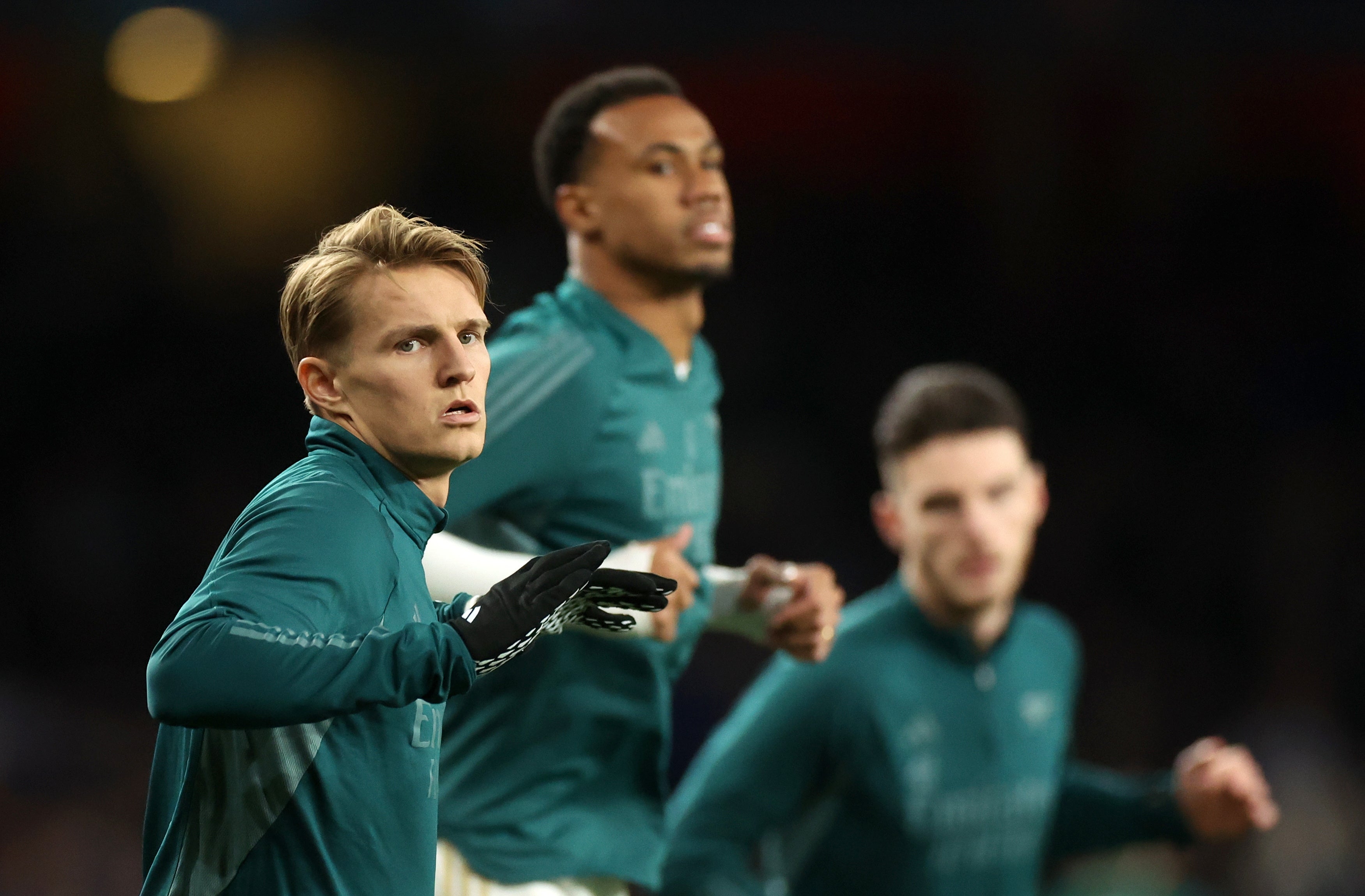 Martin Odegaard warms up before kick-off