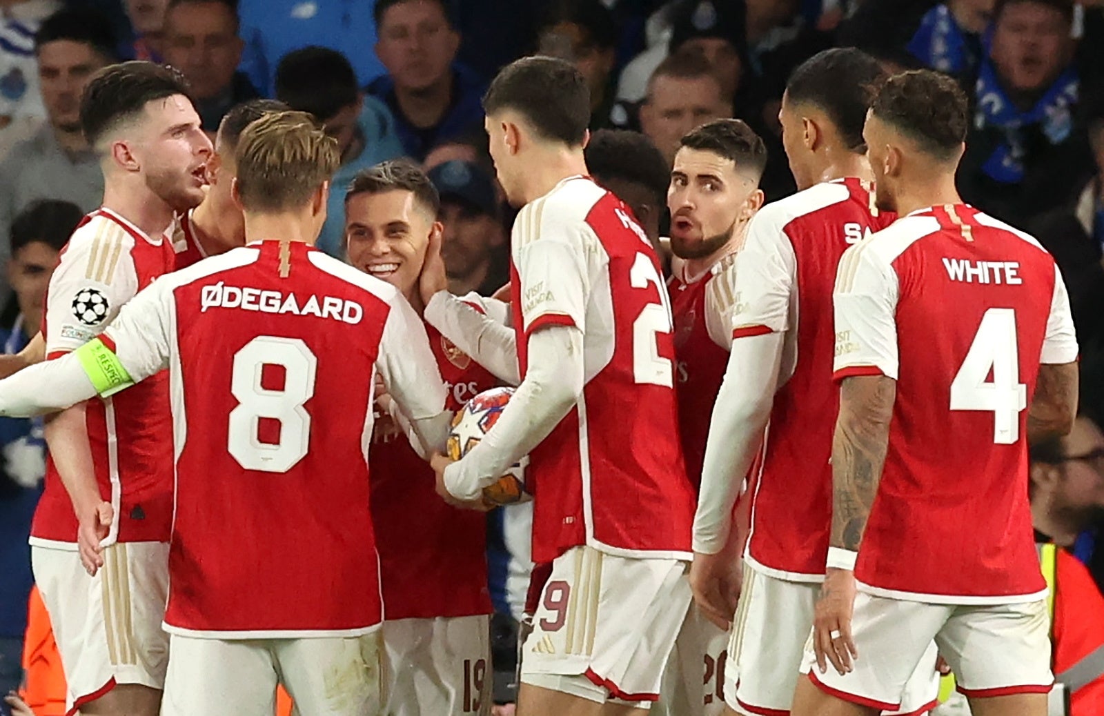 Arsenal teammates congratulate Trossard