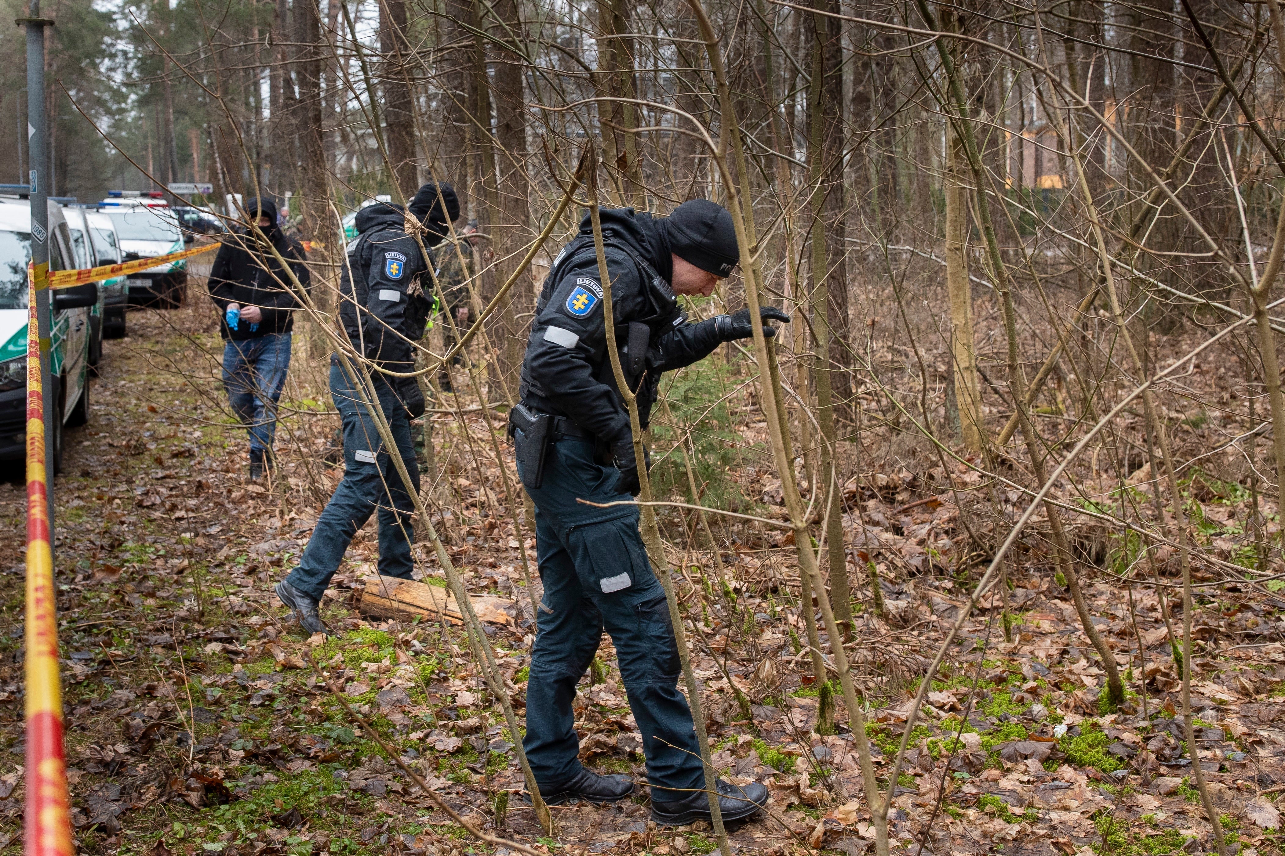 Police officers inspects the area near the house of Leonid Volkov, a close associate of the late Russian opposition leader Alexei Navalny